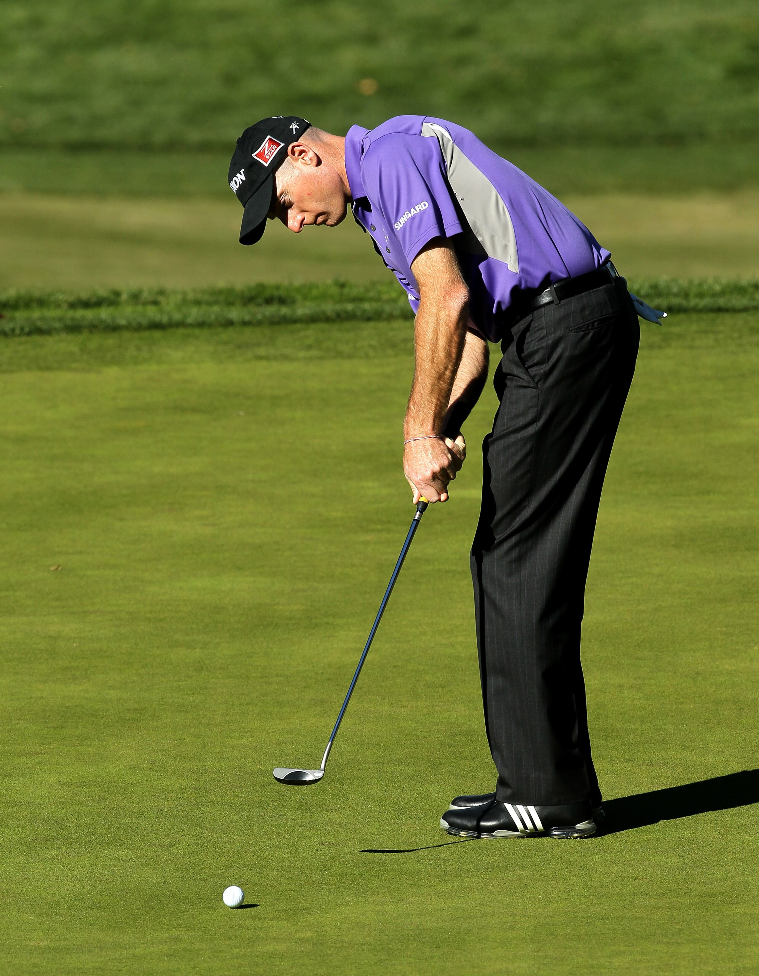 THOUSAND OAKS, CA - DECEMBER 02:  Jim Furyk putts on the fifth hole during the Chevron World Challenge at Sherwood Country Club on December 2, 2010 in Thousand Oaks, California.  (Photo by Stephen Dunn/Getty Images)