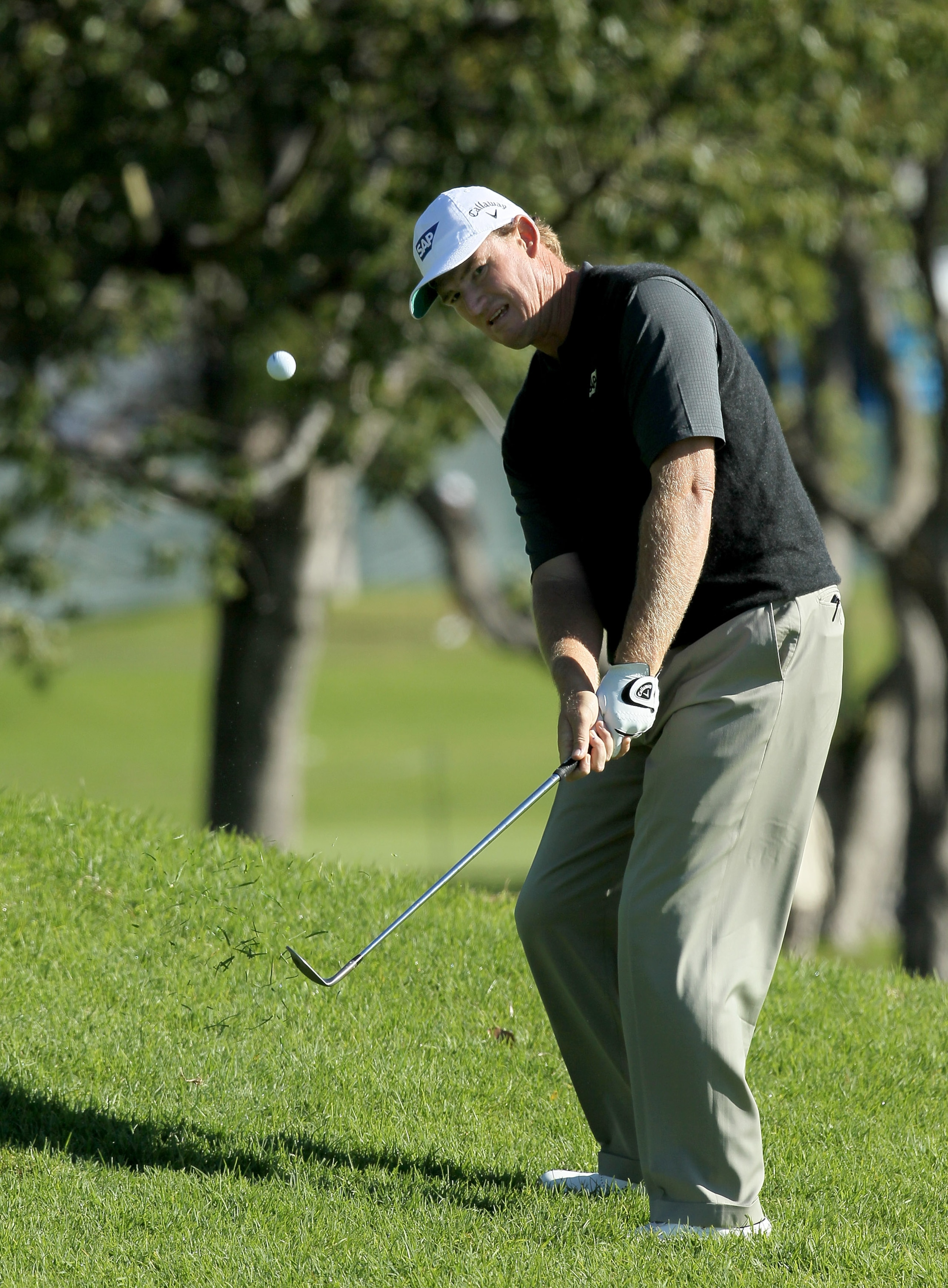 PACIFIC PALISADES, CA - FEBRUARY 07:  Ernie Els of South Africa chips onto the green on the second hole during the final round of the Northern Trust Open at Riviera Country Club on February 7, 2010 in Pacific Palisades, California.  (Photo by Stephen Dunn