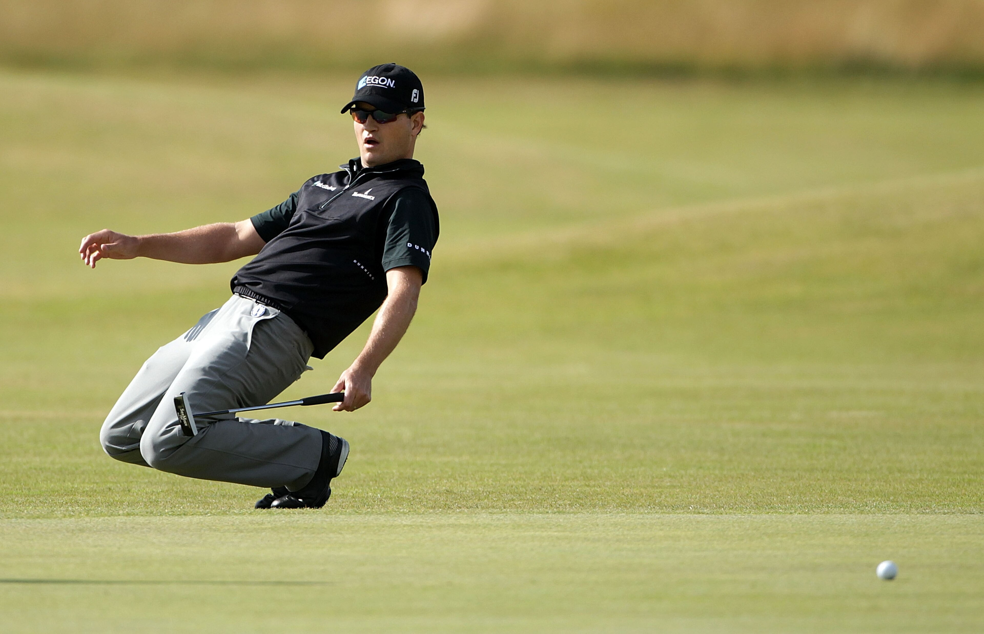 ST ANDREWS, SCOTLAND - JULY 15:  Zach Johnson of the USA reacts to a missed putt on the 9th hole during the first round of the 139th Open Championship on the Old Course, St Andrews on July 15, 2010 in St Andrews, Scotland.  (Photo by Andrew Redington/Gett