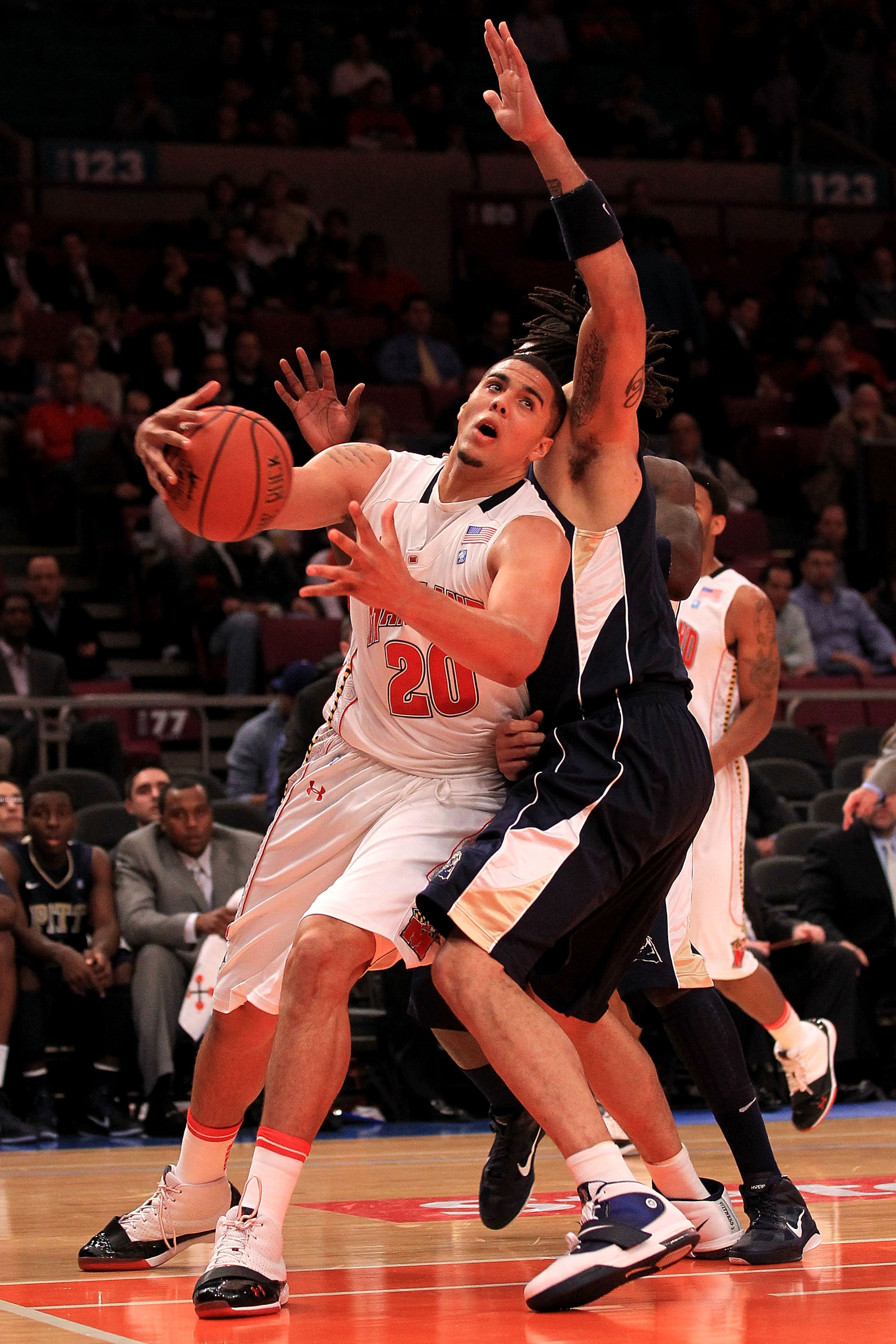 NEW YORK - NOVEMBER 18:  Jordan Williams #20 of the Maryland Terrapin drives past Gary McGhee #52 of the Pittsburgh Panthers during the 2k Sports Classic at Madison Square Garden on November 18, 2010 in New York, New York.  (Photo by Chris McGrath/Getty I