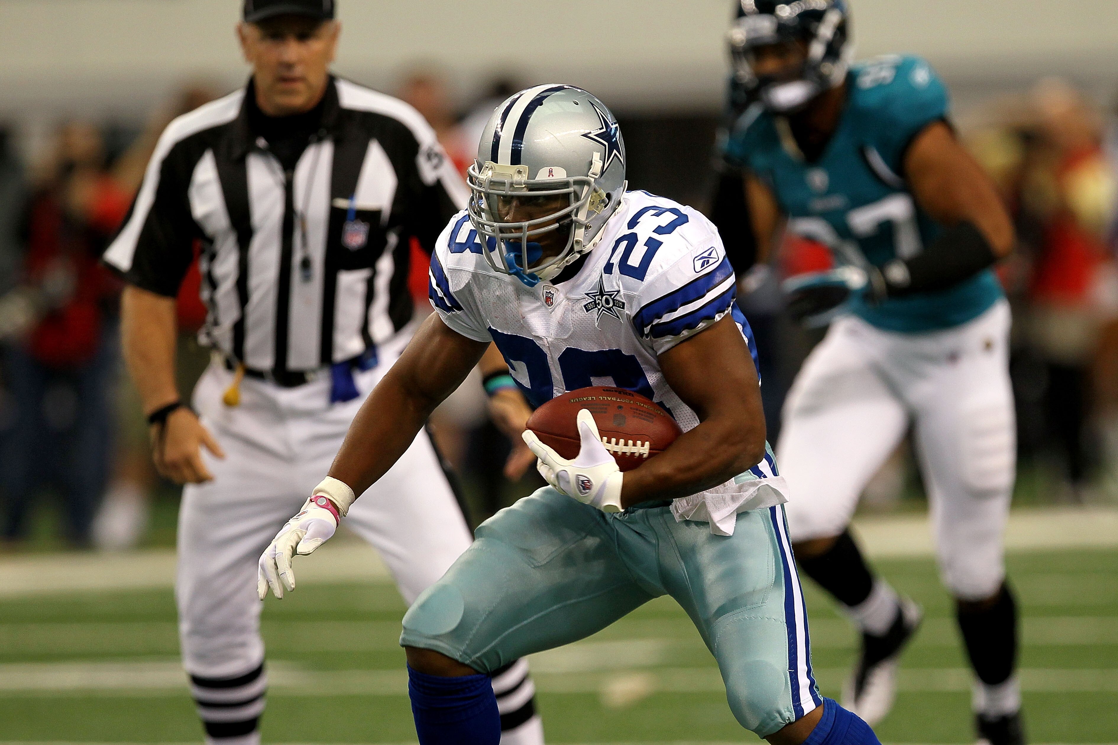 ARLINGTON, TX - OCTOBER 31:  Tashard Choice #23 of the Dallas Cowboys runs the ball against the Jacksonville Jaguars at Cowboys Stadium on October 31, 2010 in Arlington, Texas.  (Photo by Stephen Dunn/Getty Images)