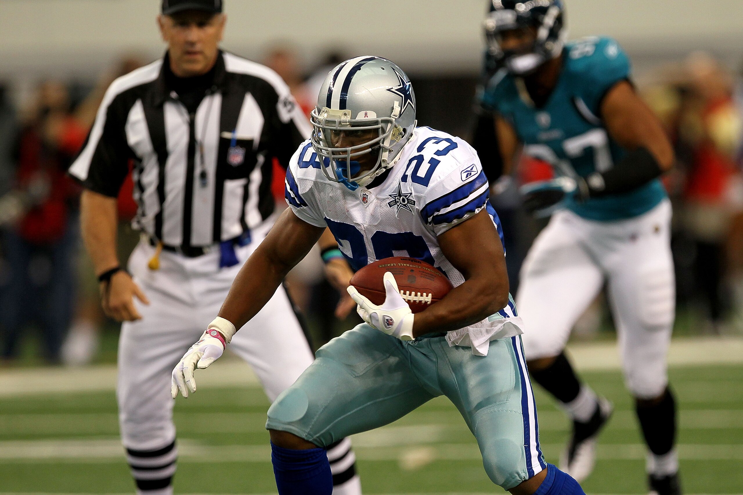 ARLINGTON, TX - OCTOBER 31:  Tashard Choice #23 of the Dallas Cowboys runs the ball against the Jacksonville Jaguars at Cowboys Stadium on October 31, 2010 in Arlington, Texas.  (Photo by Stephen Dunn/Getty Images)