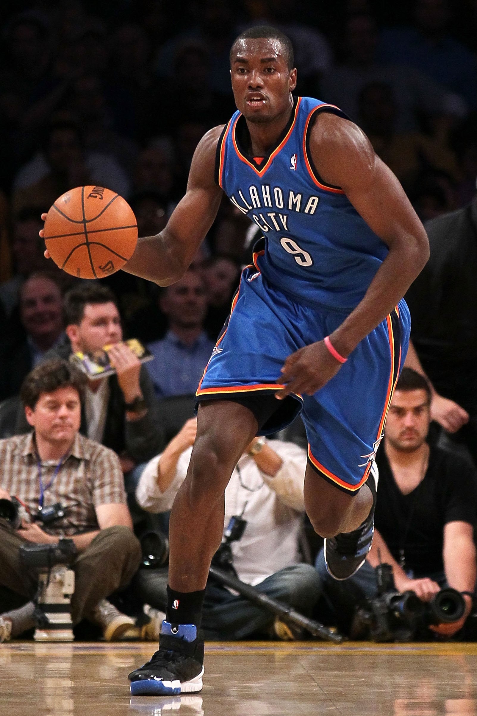 LOS ANGELES, CA - APRIL 27:  Serge Ibaka #9 of the Oklahoma City Thunder moves the ball while taking on the Los Angeles Lakers during Game Five of the Western Conference Quarterfinals of the 2010 NBA Playoffs at Staples Center on April 27, 2010 in Los Ang