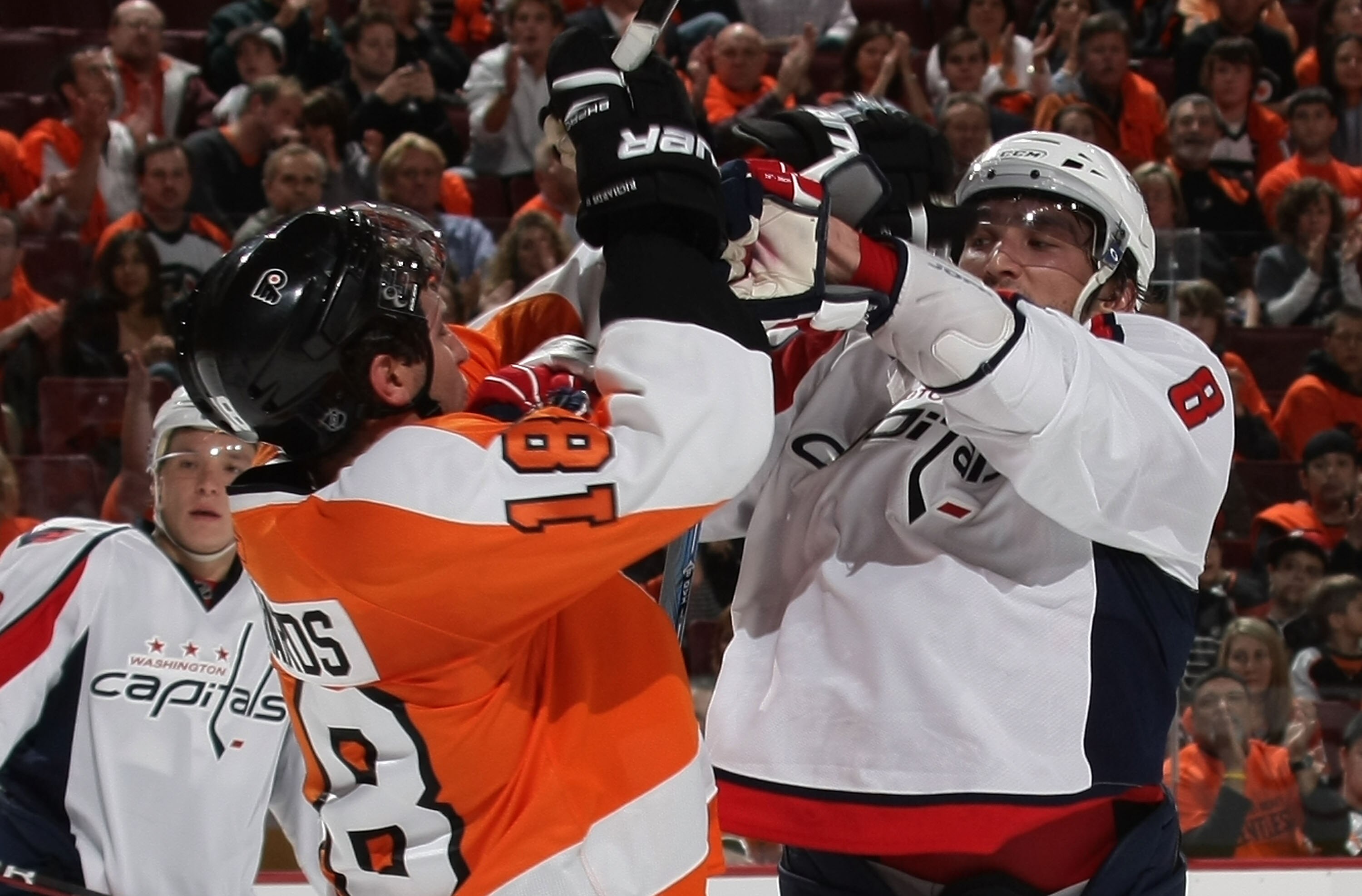 PHILADELPHIA - OCTOBER 06: Alex Ovechkin #8  of the Washington Capitals hits Mike Richards #18 of the Phildelphia Flyers at the Wachovia Center on October 6, 2009 in Philadelphia, Pennsylvania. (Photo by Bruce Bennett/Getty Images)