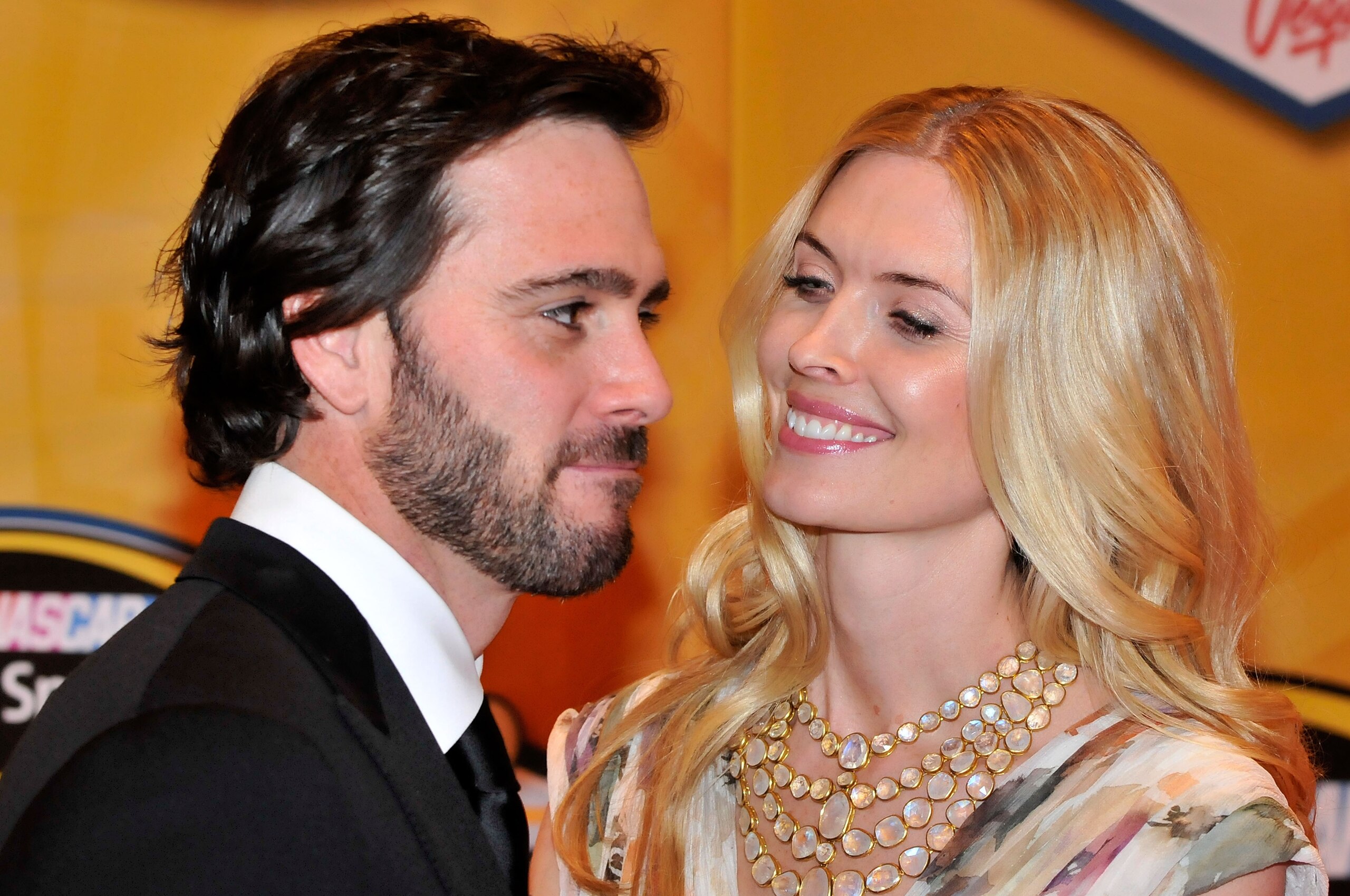 LAS VEGAS, NV - DECEMBER 03:  (L-R) Five-time champion Jimmie Johnson and his wife Chandra arrive at the NASCAR Sprint Cup Series awards banquet at the Wynn Las Vegas Hotel on December 3, 2010 in Las Vegas, Nevada.  (Photo by David Becker/Getty Images for