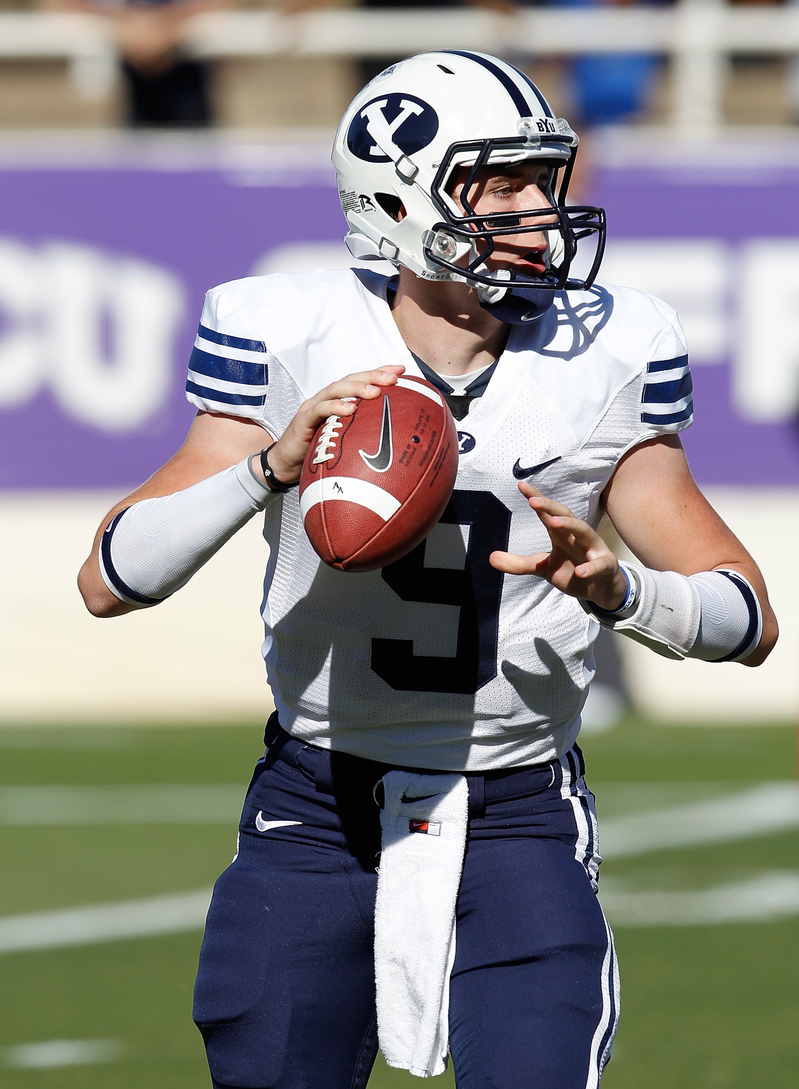 FORT WORTH, TX - OCTOBER 16:  Quarterback Jake Heaps #9 of the Brigham Young University Cougars throws a pass against the Texas Christian University Horned Frogs at Amon G. Carter Stadium on October 16, 2010 in Fort Worth, Texas.  (Photo by Tom Pennington