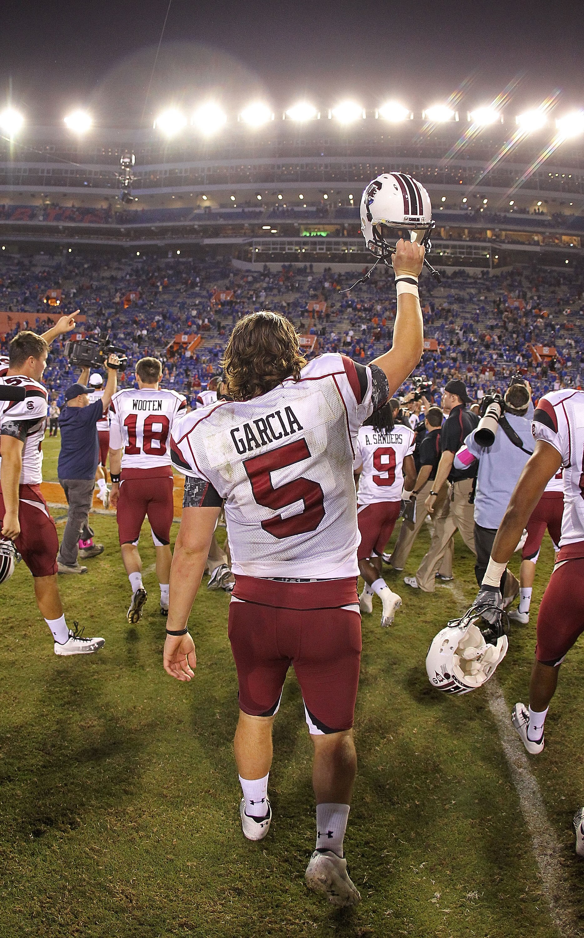 GAINESVILLE, FL - NOVEMBER 13:  Stephen Garcia #5 of the South Carolina Gamecocks waves to fans after winning a game against the Florida Gators at Ben Hill Griffin Stadium on November 13, 2010 in Gainesville, Florida. The Gamecocks beat the Gators 36-14.