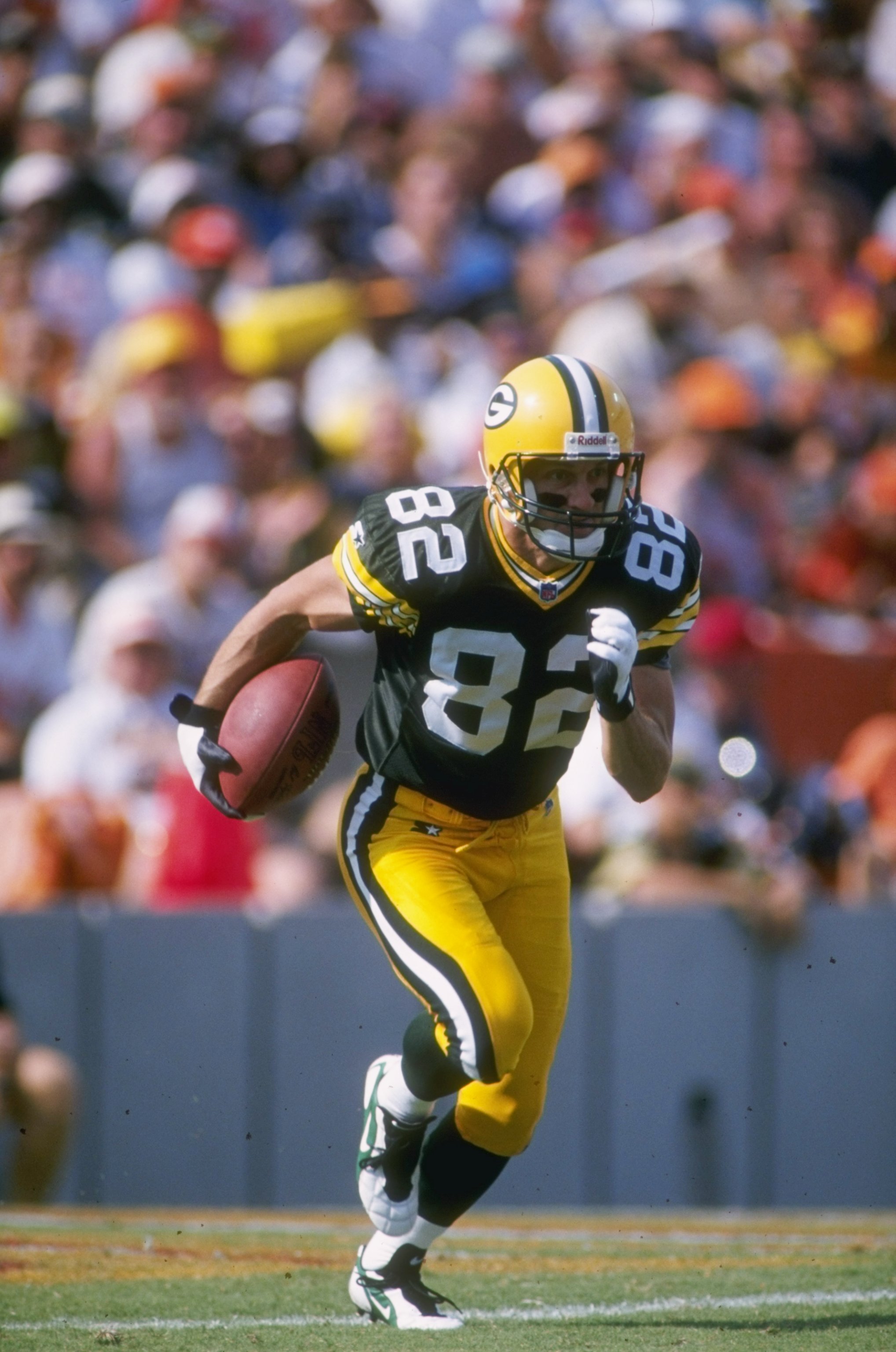 Wide receiver and kick returner Don Beebe of the Green Bay Packers returns a kick during the Packers 34-3 victory over the Tampa Bay Buccaneers at Tampa Stadium in Tampa, Florida.