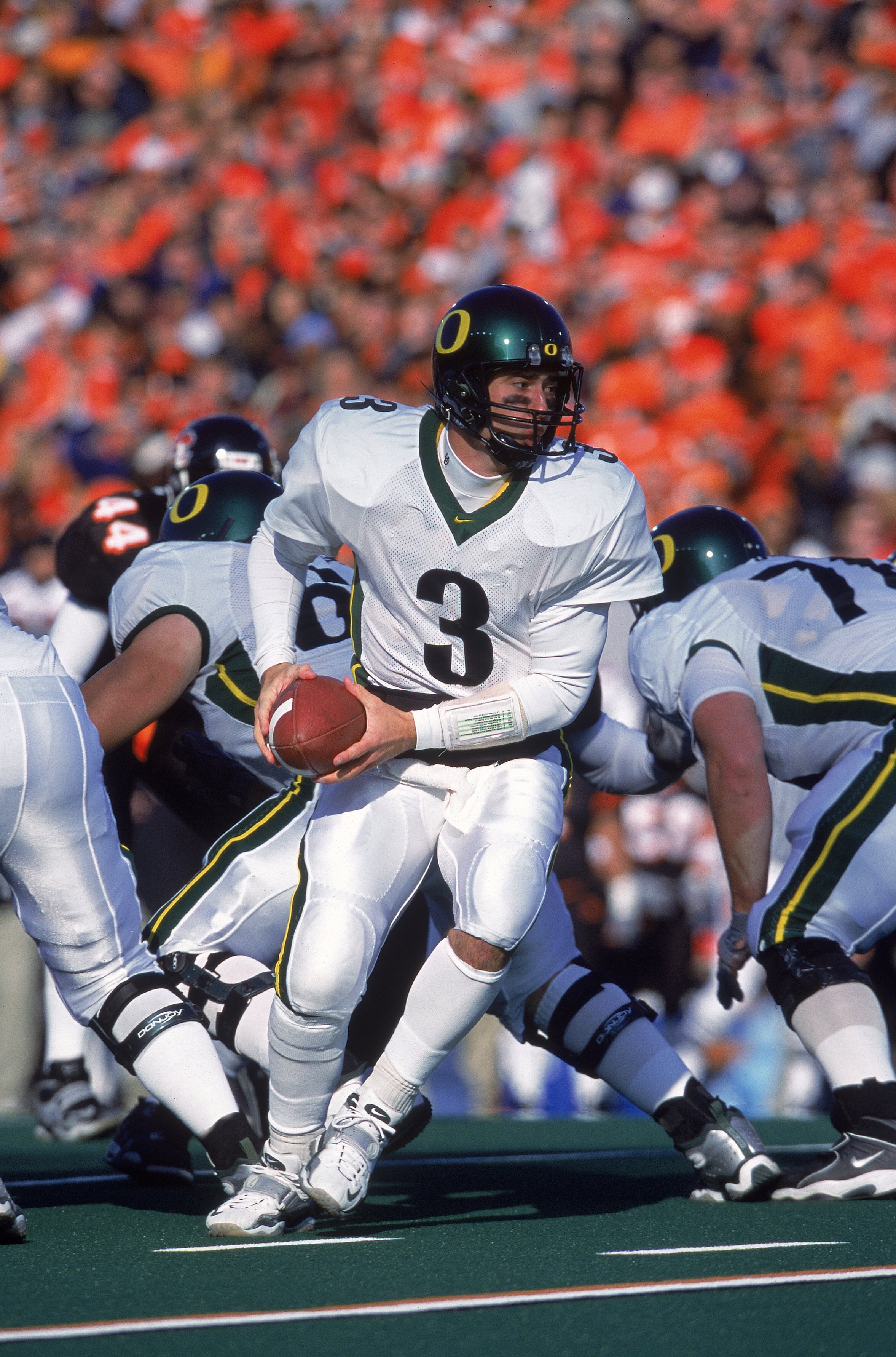 18 Nov 2000:  Joey Harrington #3 of the Oregon Ducks moves with the ball during the game against the Oregon State Beavers at Reser Stadium in Corvallis, Oregon. The Beavers defeated the Ducks 23-13.Mandatory Credit: Otto Greule Jr.  /Allsport