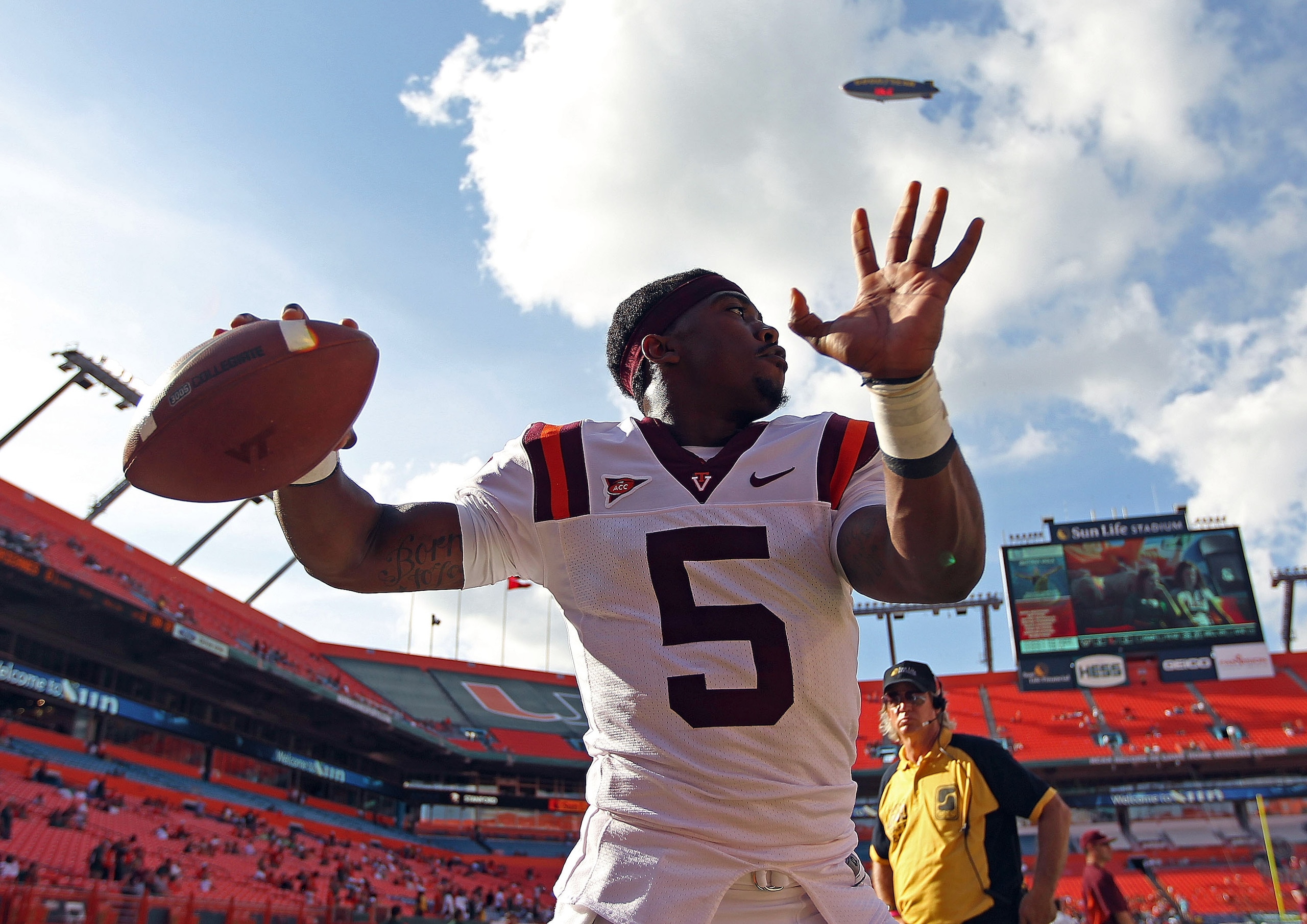 MIAMI - NOVEMBER 20:  Tyrod Taylor #5 of the Virginia Tech Hokies warms up during a game against the Miami Hurricanes at Sun Life Stadium on November 20, 2010 in Miami, Florida.  (Photo by Mike Ehrmann/Getty Images)