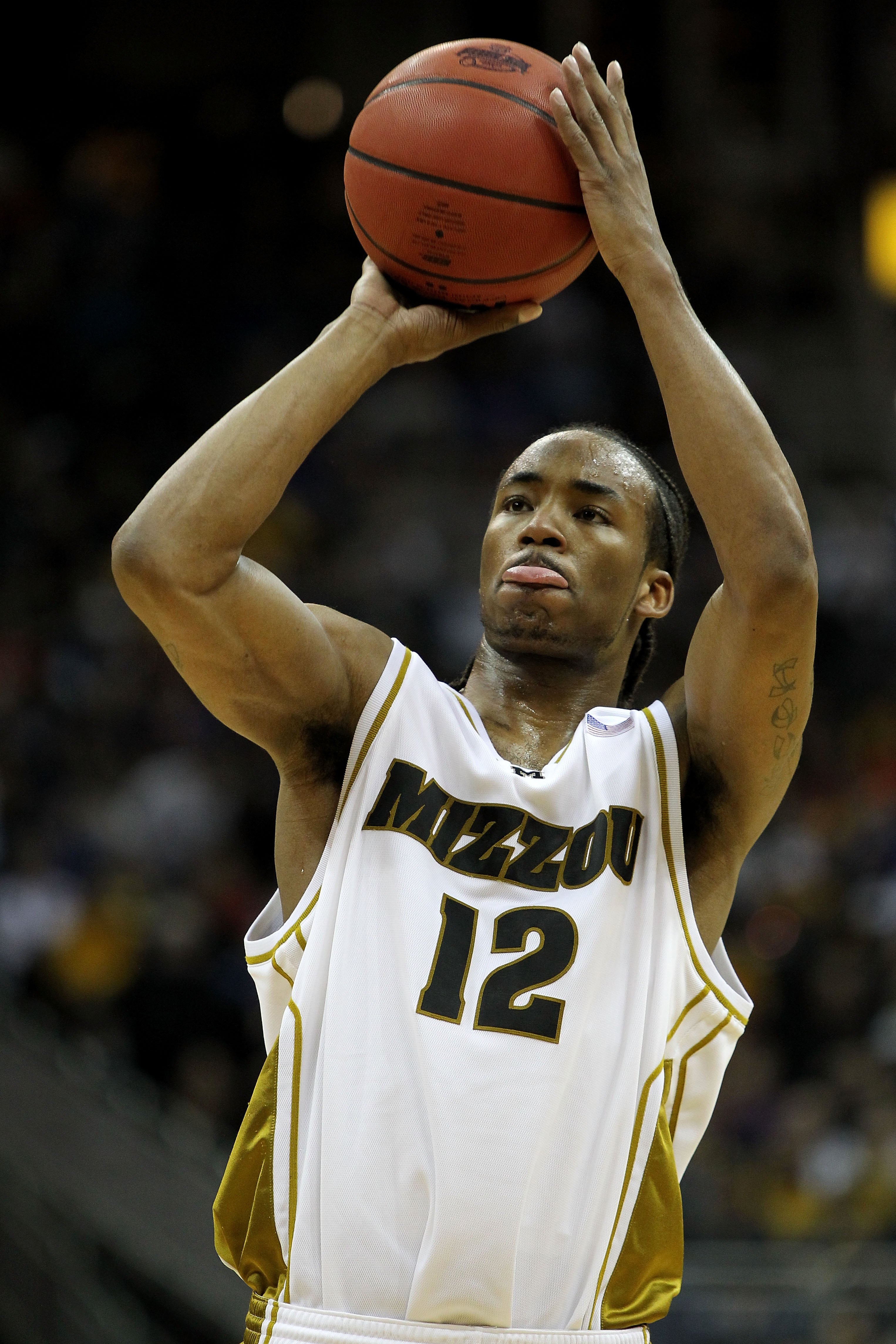 KANSAS CITY, MO - MARCH 10:  Marcus Denmon #12 of the Missouri Tigers shoots a free throw against the Nebraska Cornhuskers in the first half during the first round game of the 2010 Phillips 66 Big 12 Men's Basketball Tournament at the Sprint Center on Mar