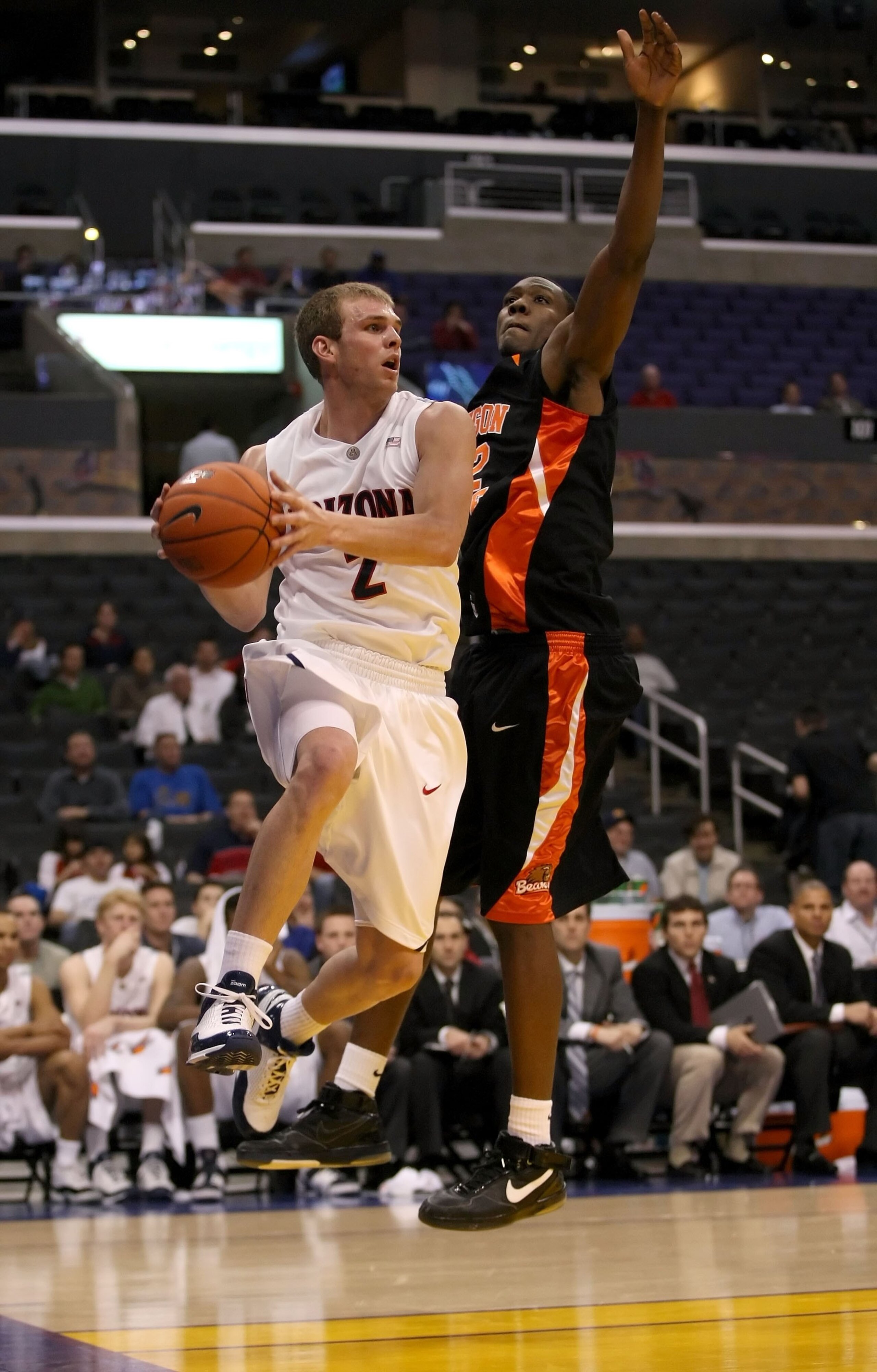 LOS ANGELES, CA - MARCH 12: Zane Johnson #2 of the Arizona Wildcats moves against the defense of Sean Carter #32 of the Oregon State Beavers during the 2008 Pacific Life Pac-10 Men's Basketball Tournament Day One at Staples Center on March 12, 2008 in Los