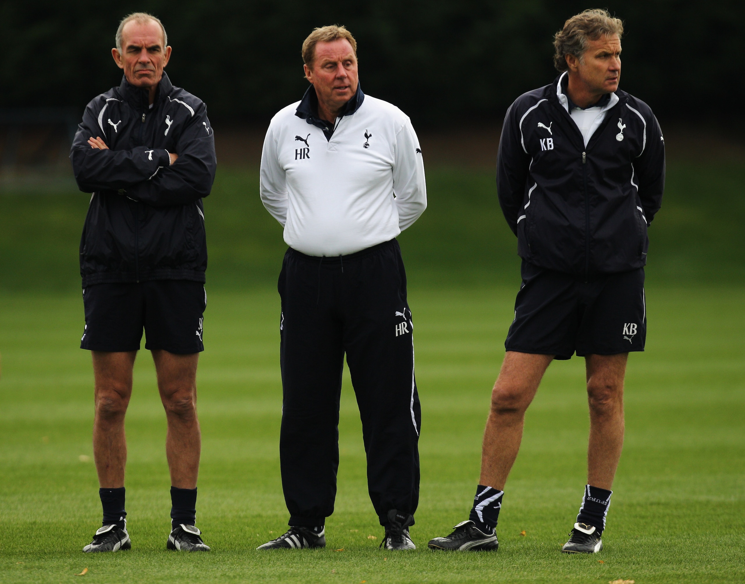 LONDON, ENGLAND - NOVEMBER 01:  Tottenham Manager,  Harry Redknapp (C) looks with his staff Kevin Bond (R) and Joe Jordan (L) during the Tottenham Hotspur training session ahead of their UEFA Champions League group stage match against Inter Milan at Totte