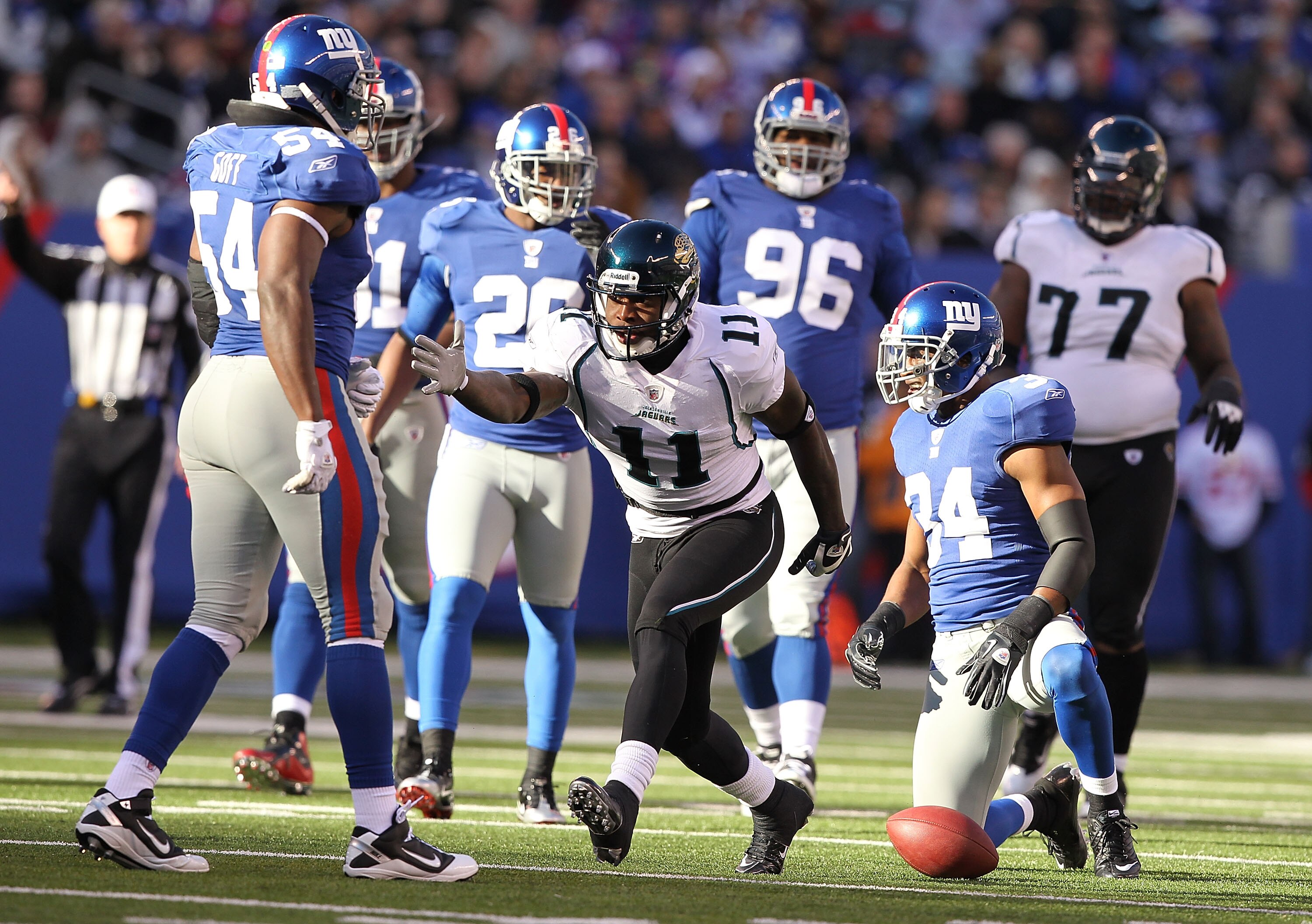 EAST RUTHERFORD, NJ - NOVEMBER 28: Mike Sims Walker #11 of the Jacksonville Jaguars signals a first down against  the New York Giants during their game on November 28, 2010 at The New Meadowlands Stadium in East Rutherford, New Jersey.  (Photo by Al Bello