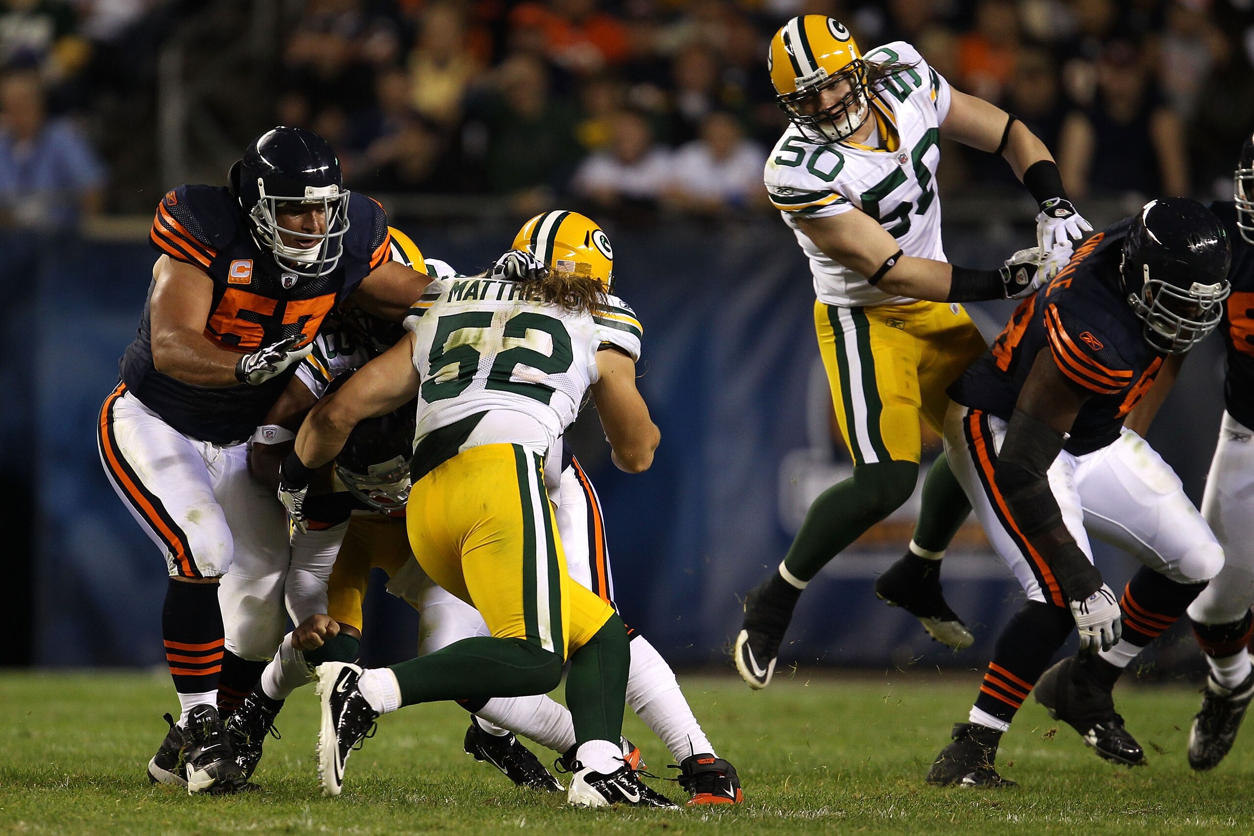 CHICAGO - SEPTEMBER 27:  Linebackers Clay Matthews #52 and A.J. Wahk #50 of the Green Bay Packers defend against the Chicago Bears at Soldier Field on September 27, 2010 in Chicago, Illinois.  (Photo by Jonathan Daniel/Getty Images)
