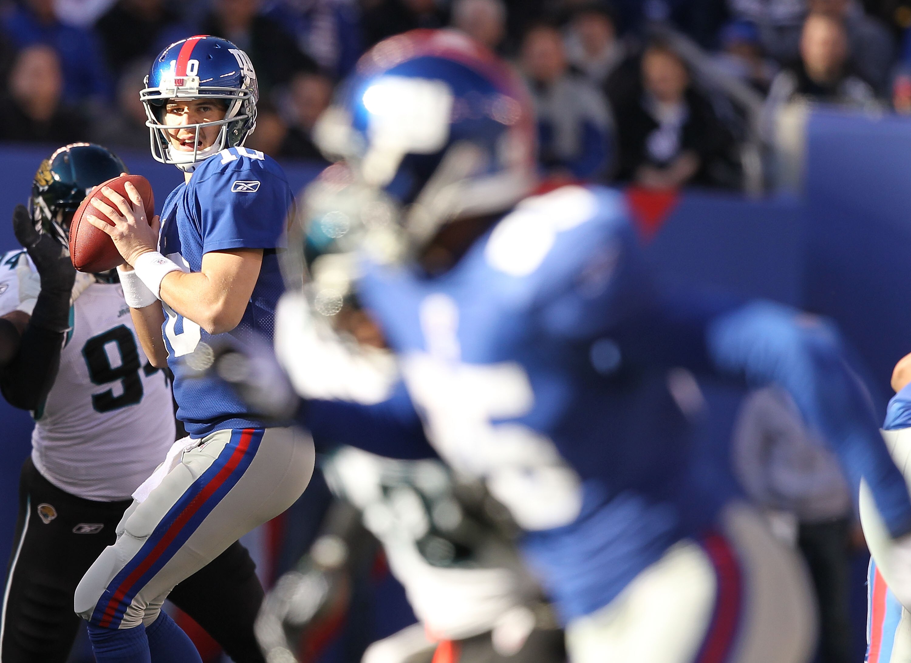 EAST RUTHERFORD, NJ - NOVEMBER 28:  Eli Manning #10 of the New York Giants looks to pass against the Jacksonville Jaguars during their game on November 28, 2010 at The New Meadowlands Stadium in East Rutherford, New Jersey.  (Photo by Al Bello/Getty Image