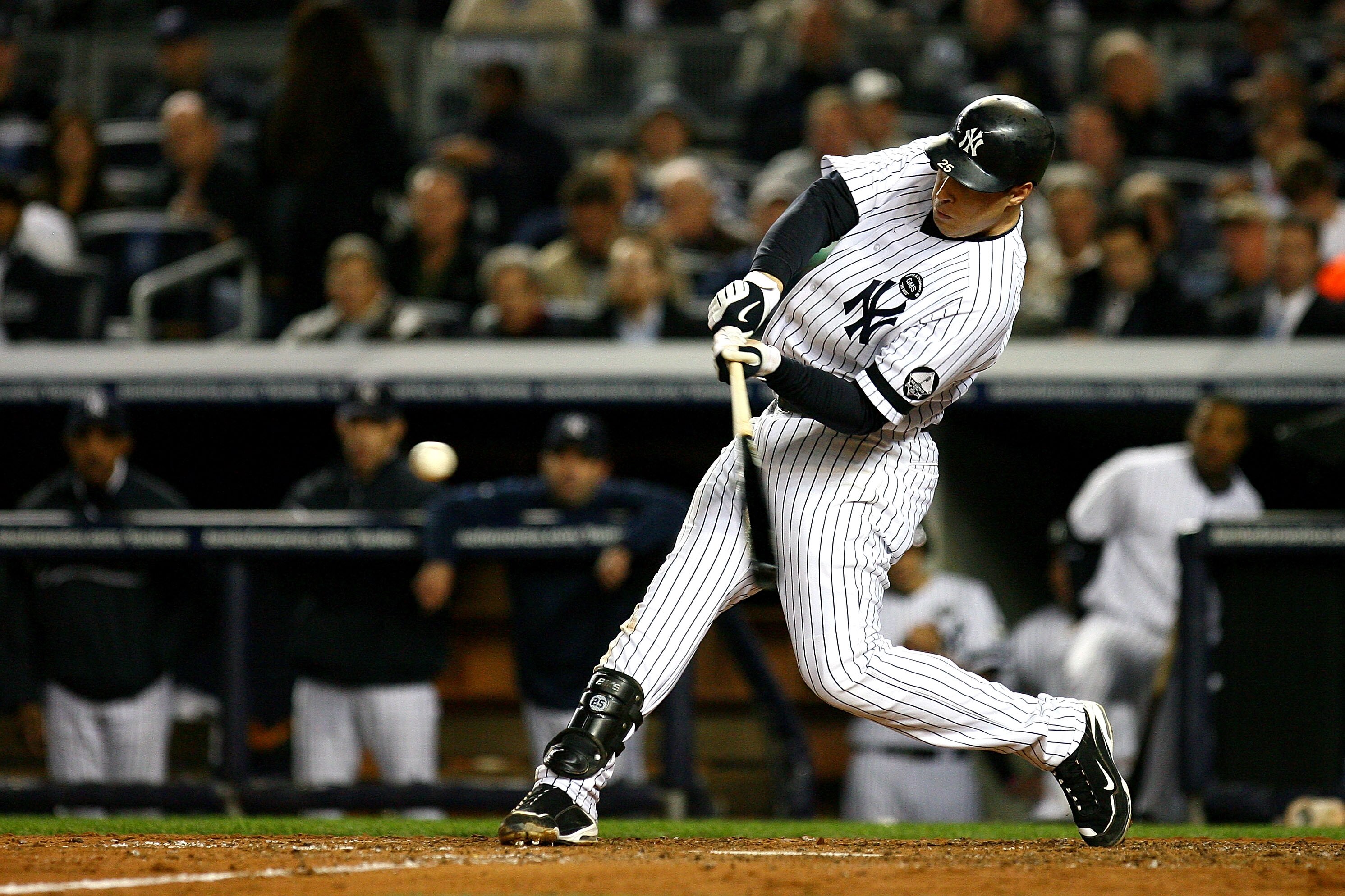 NEW YORK - OCTOBER 19:  Mark Teixeira #25 of the New York Yankees bats against the Texas Rangers in Game Four of the ALCS during the 2010 MLB Playoffs at Yankee Stadium on October 19, 2010 in the Bronx borough of New York City.  (Photo by Andrew Burton/Ge