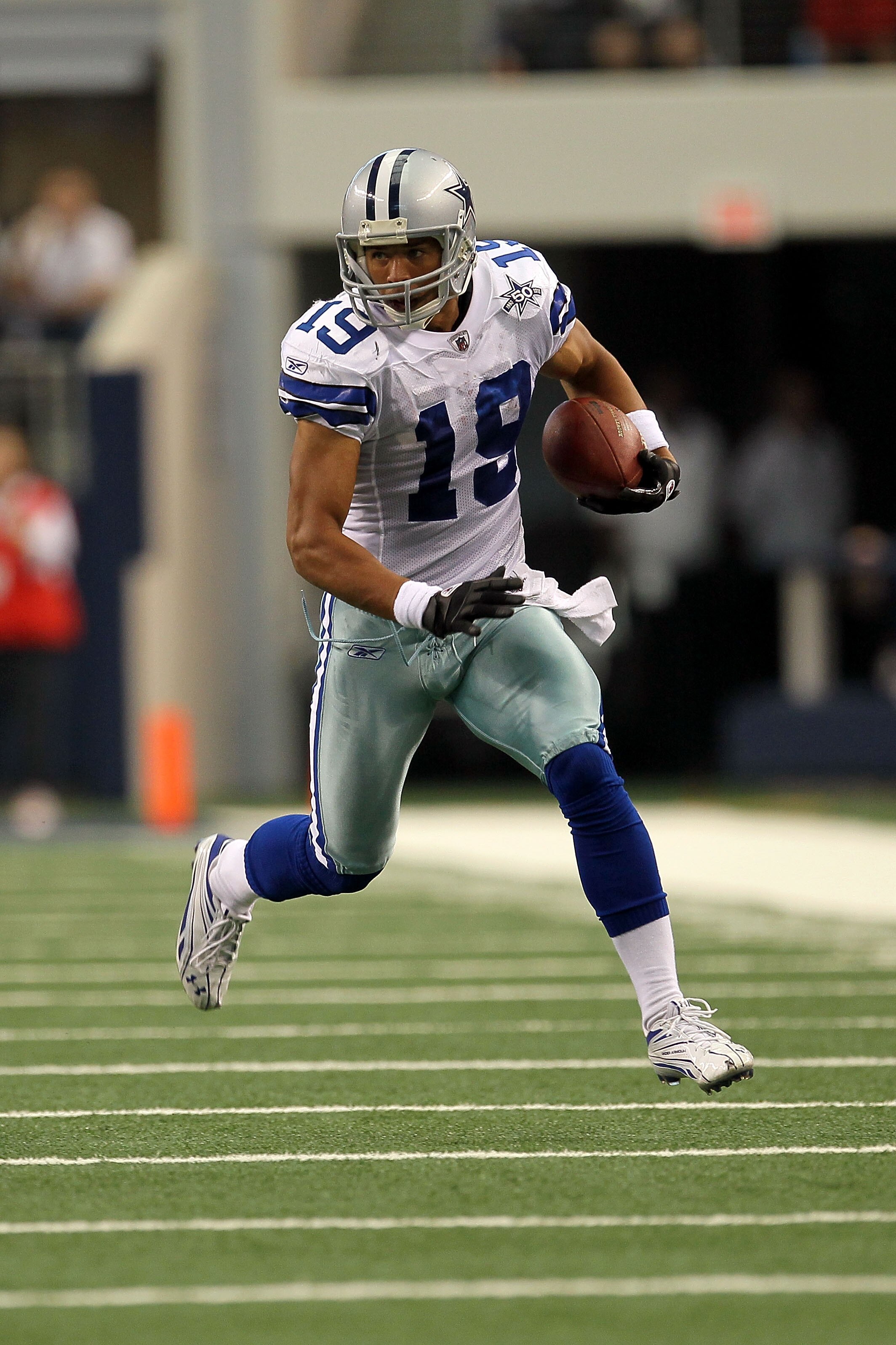 ARLINGTON, TX - OCTOBER 31:  Miles Austin #19 of the Dallas Cowboys runs for yards after the catch against the Jacksonville Jaguars at Cowboys Stadium on October 31, 2010 in Arlington, Texas.  (Photo by Stephen Dunn/Getty Images)
