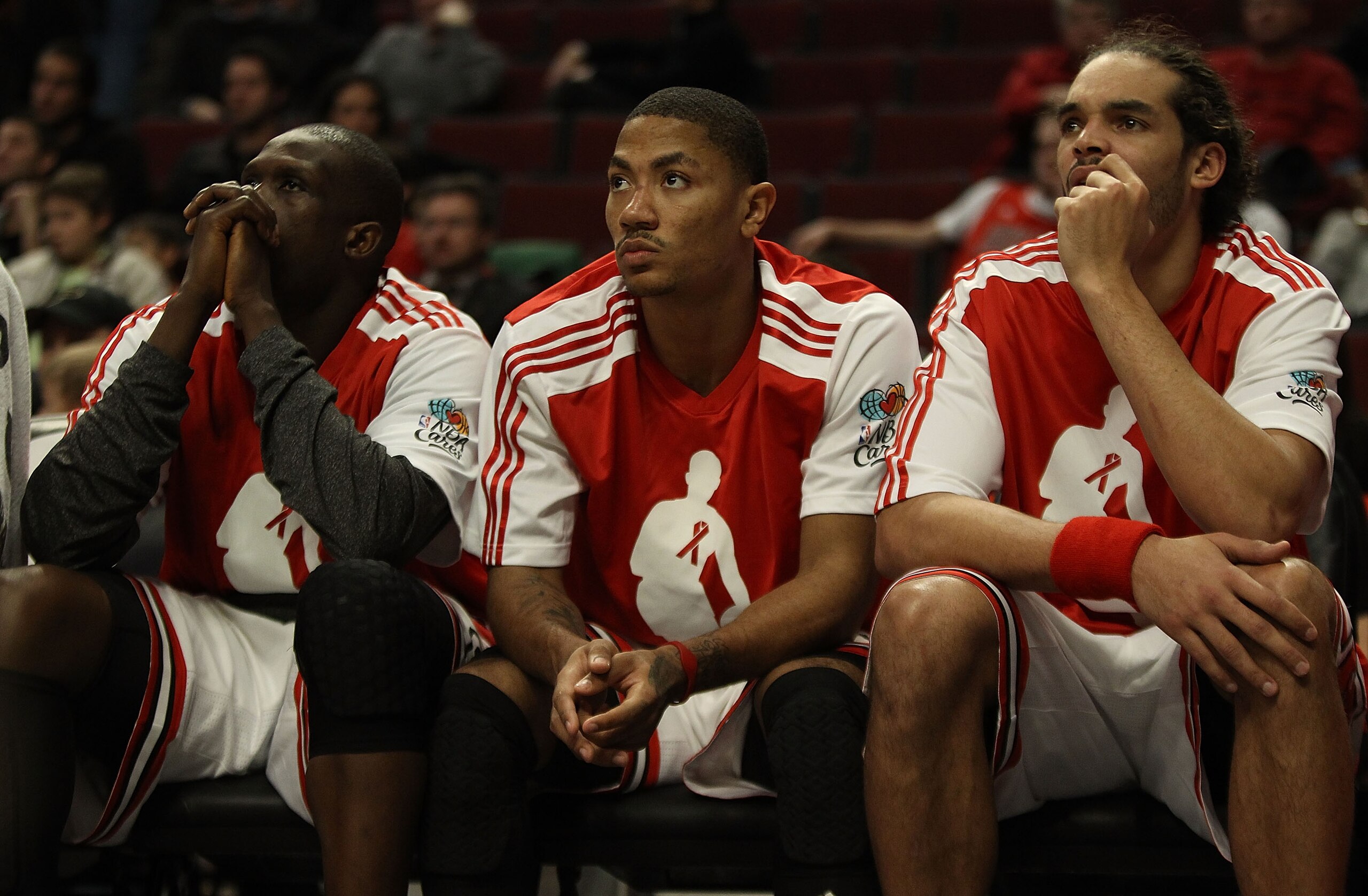 CHICAGO, IL - DECEMBER 01: (L-R) Loul Deng #9, Derrick Rose #1 and Joakim Noah #13 of the Chicago Bulls watch their teammates during a loss to the Orlando Magic at the United Center on December 1, 2010 in Chicago, Illinois. The Magic defeated the Bulls 10 CHICAGO, IL - DECEMBER 01: (L-R) Loul Deng #9, Derrick Rose #1 and Joakim Noah #13 of the Chicago Bulls watch their teammates during a loss to the Orlando Magic at the United Center on December 1, 2010 in Chicago, Illinois. The Magic defeated the Bulls 10
