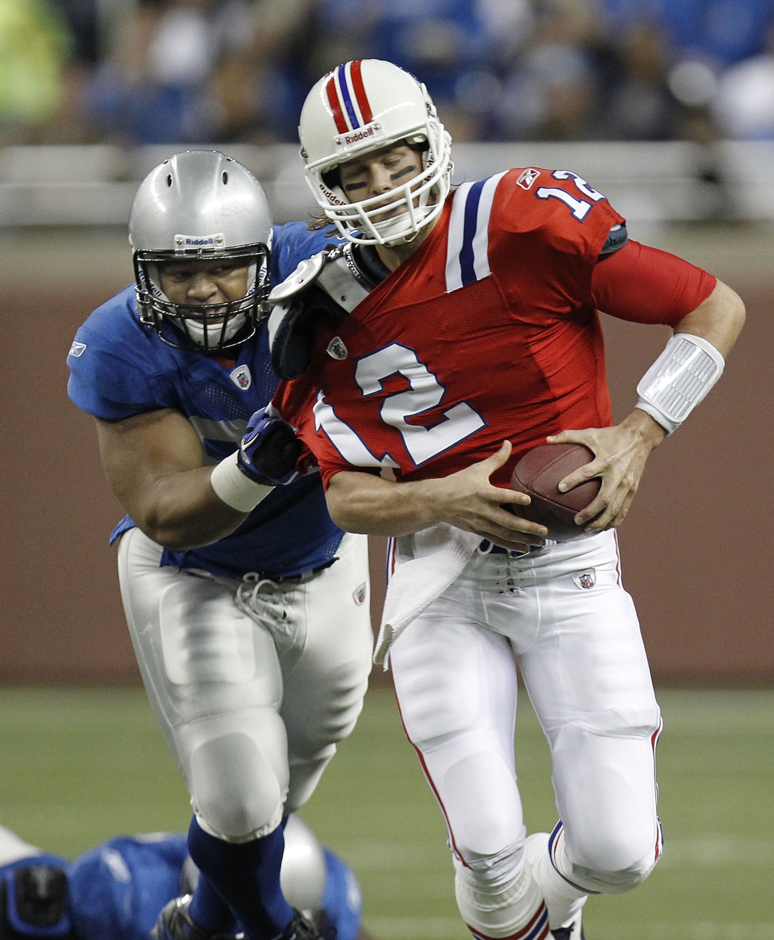 DETROIT - NOVEMBER 25: Tom Brady #12 of the New England Patriots is sacked by Ndamukong Suh #90 of the Detroit Lions on November 25, 2010 at Ford Field in Detroit, Michigan. (Photo by Gregory Shamus/Getty Images) DETROIT - NOVEMBER 25: Tom Brady #12 of the New England Patriots is sacked by Ndamukong Suh #90 of the Detroit Lions on November 25, 2010 at Ford Field in Detroit, Michigan. (Photo by Gregory Shamus/Getty Images)