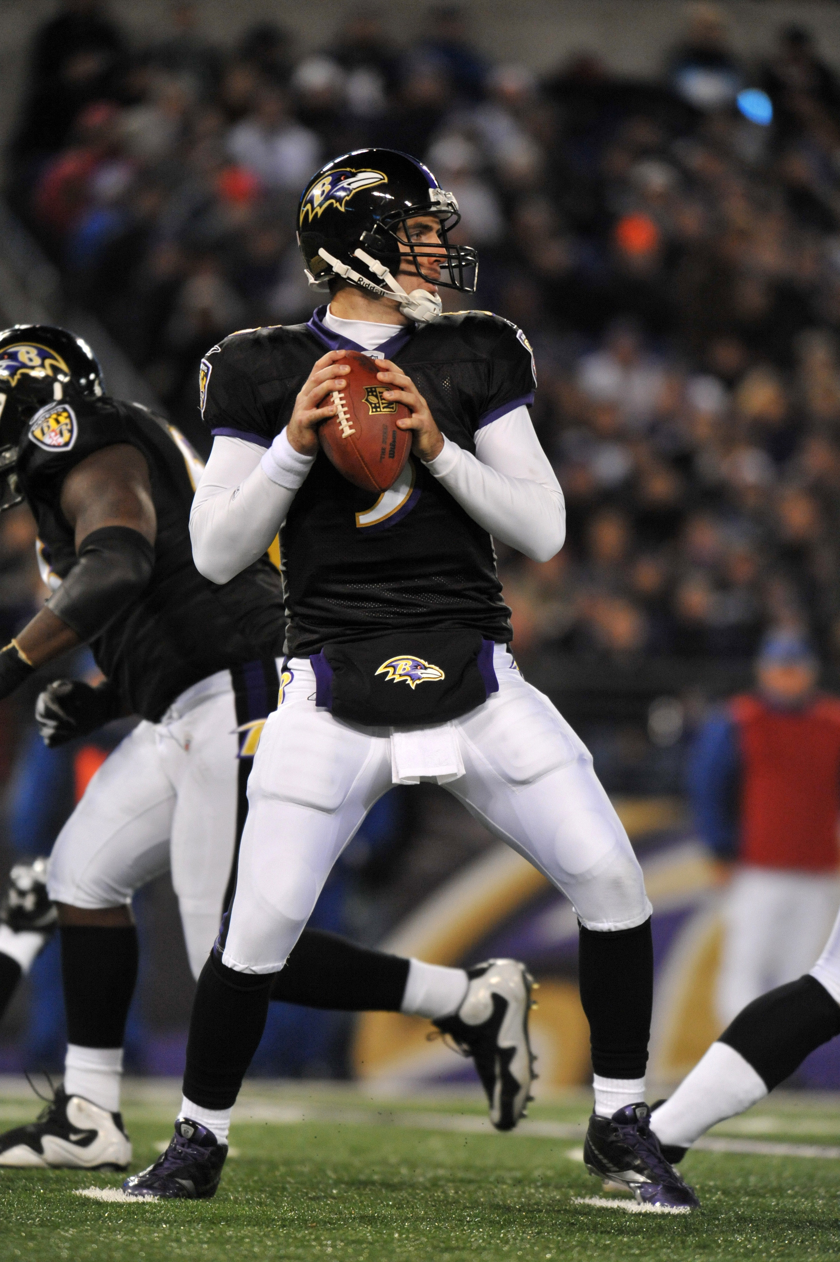 BALTIMORE, MD - NOVEMBER 28:  Joe Flacco #5 of the Baltimore Ravens passes against the Tampa Bay Buccaneers at M&T Bank Stadium on November 28, 2010 in Baltimore, Maryland. The Ravens lead the Buccaneers at the half 17-3. (Photo by Larry French/Getty Imag