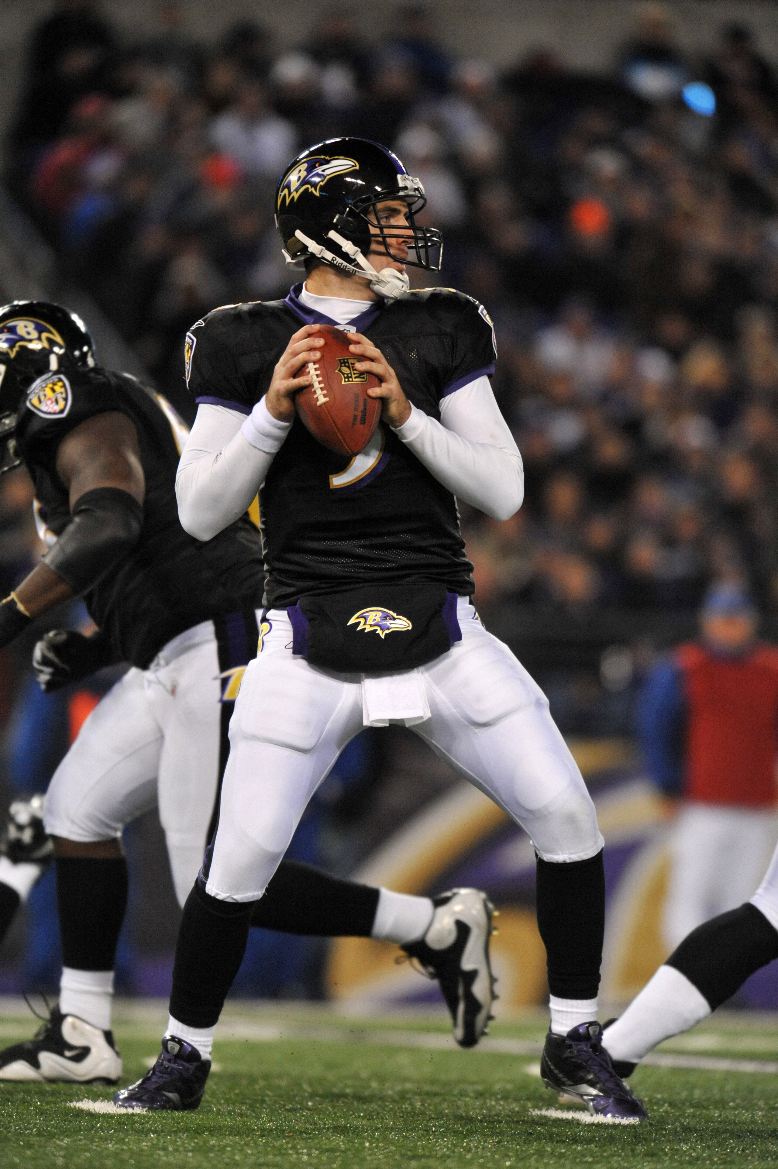 BALTIMORE, MD - NOVEMBER 28:  Joe Flacco #5 of the Baltimore Ravens passes against the Tampa Bay Buccaneers at M&T Bank Stadium on November 28, 2010 in Baltimore, Maryland. The Ravens lead the Buccaneers at the half 17-3. (Photo by Larry French/Getty Imag
