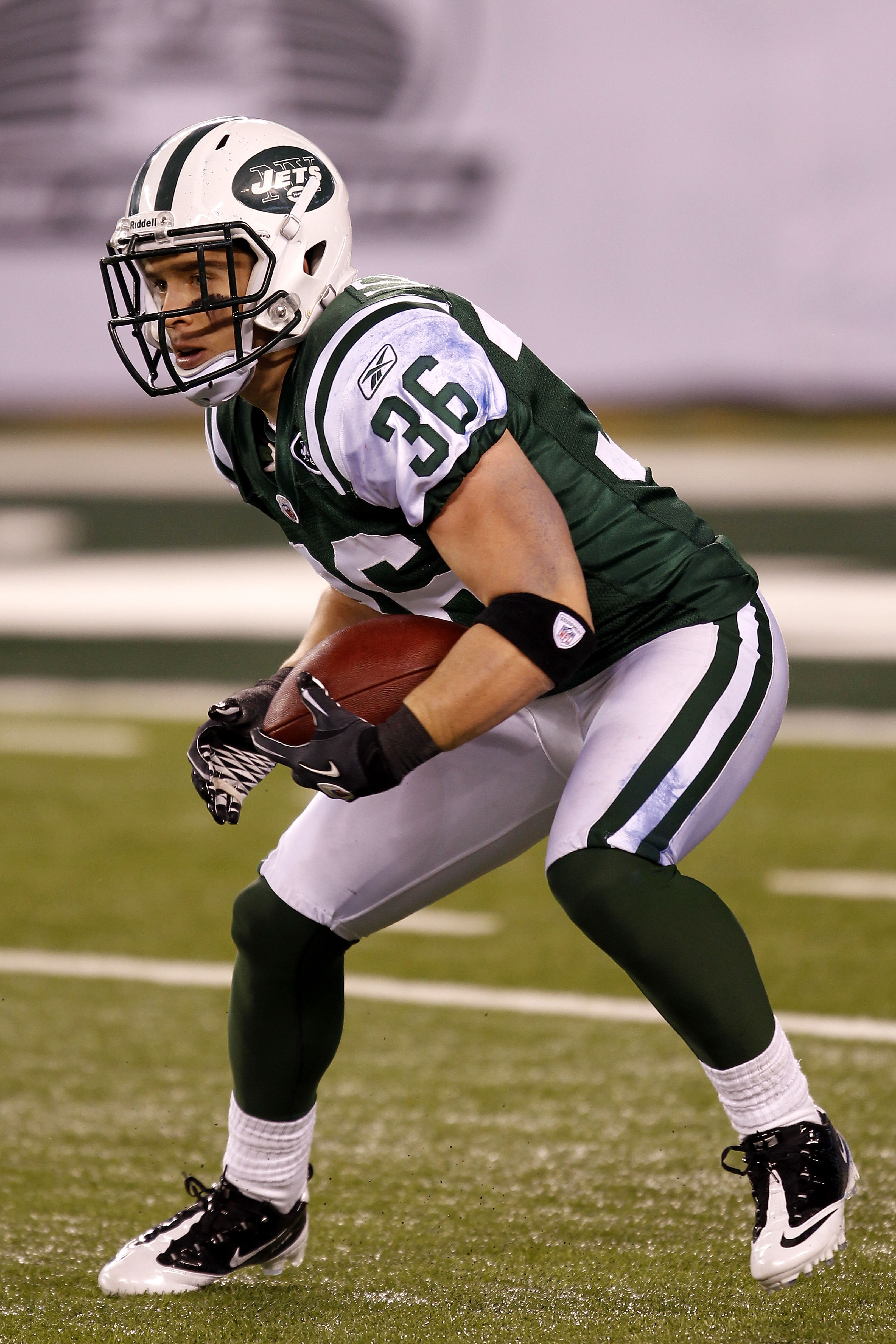 EAST RUTHERFORD, NJ - NOVEMBER 25:  Jim Leonhard #36 of the New York Jets runs with the ball against the Cincinnati Bengals at New Meadowlands Stadium on November 25, 2010 in East Rutherford, New Jersey. The Jets defeated the Bengal 26-10.  (Photo by Chri
