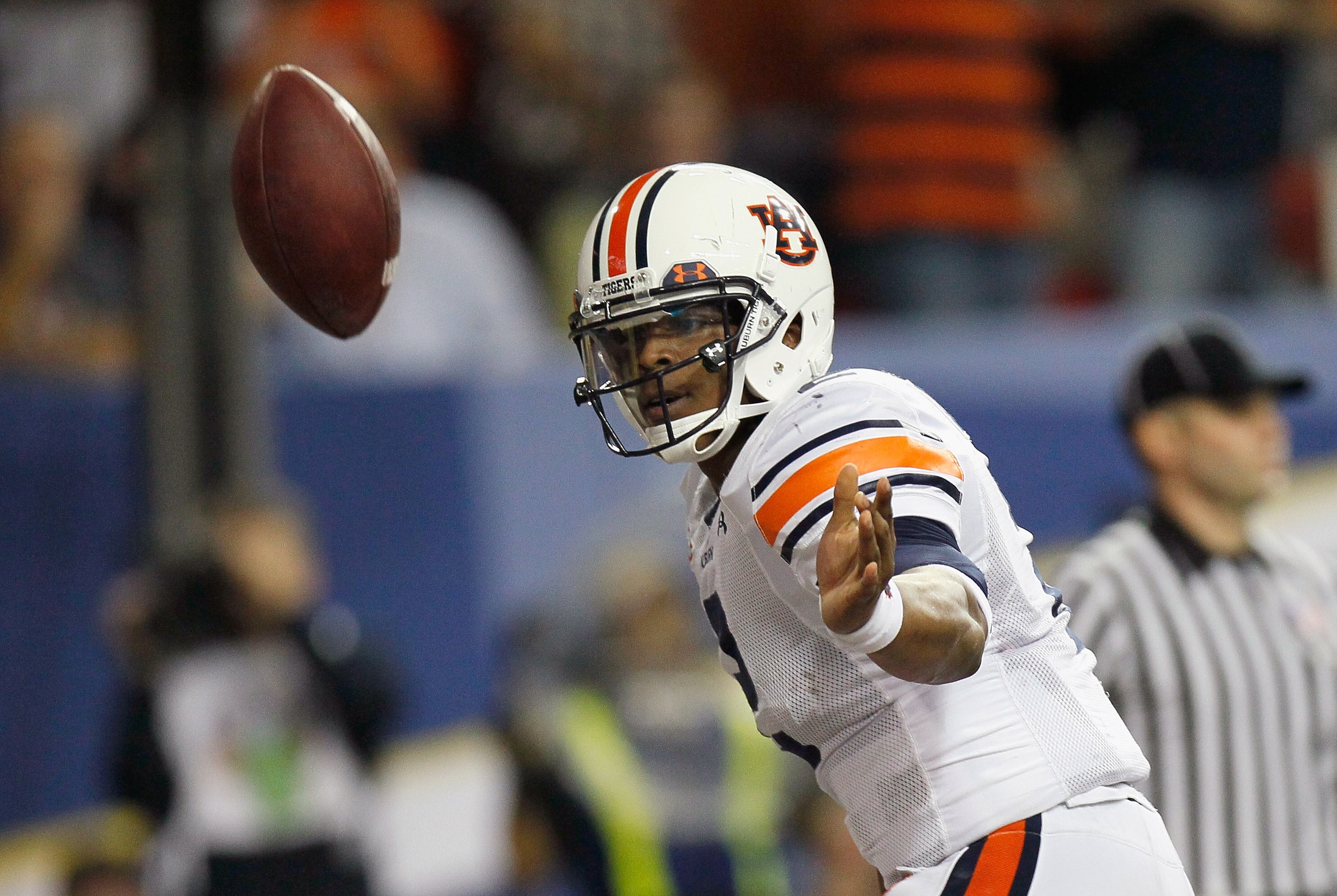 ATLANTA, GA - DECEMBER 04:  Quarterback Cam Newton #2 of the Auburn Tigers reacts after rushing for a toucdown against the South Carolina Gamecocks during the 2010 SEC Championship at Georgia Dome on December 4, 2010 in Atlanta, Georgia.  (Photo by Kevin
