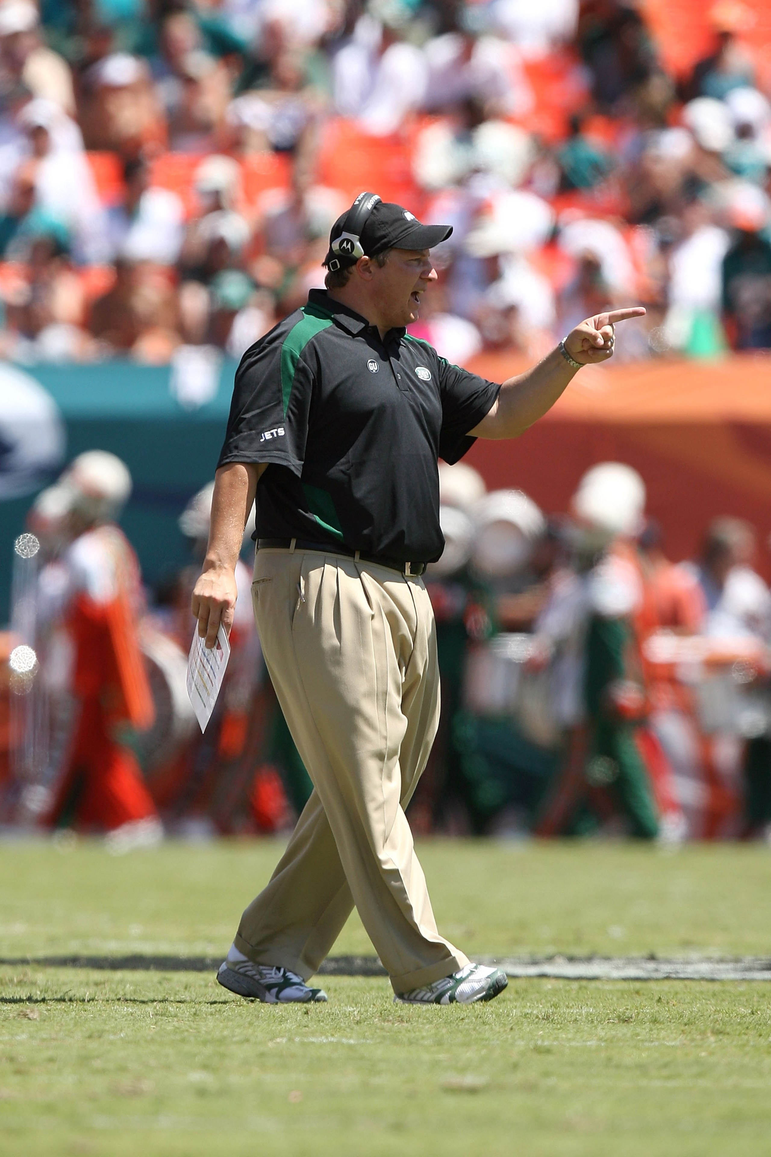 MIAMI - SEPTEMBER 07:  Head coach Eric Mangini of the New York Jets coaches against the Miami Dolphins at Dolphin Stadium on September 7, 2008 in Miami, Florida.  (Photo by Doug Benc/Getty Images)