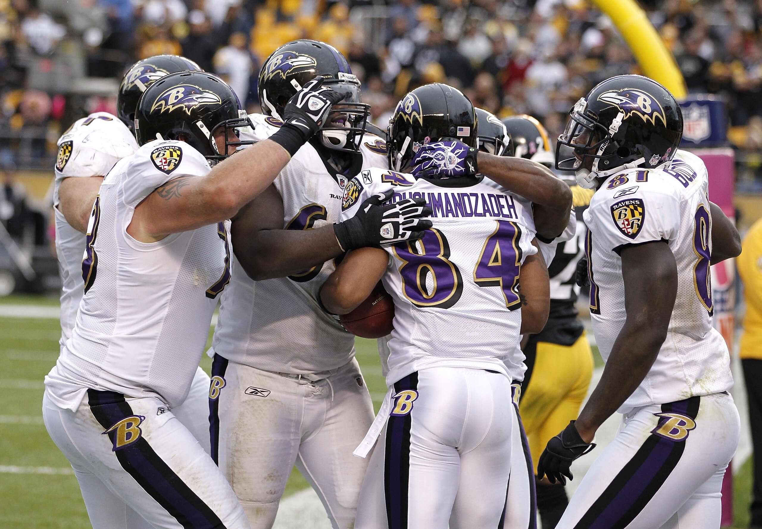 PITTSBURGH - OCTOBER 03: T.J. Houshmandzadeh #84 of the Baltimore Ravens celebrates his game winning touchdown with teammates while playing the Pittsburgh Steelers on October 3, 2010 at Heinz Field in Pittsburgh, Pennsylvania.  (Photo by Gregory Shamus/Ge