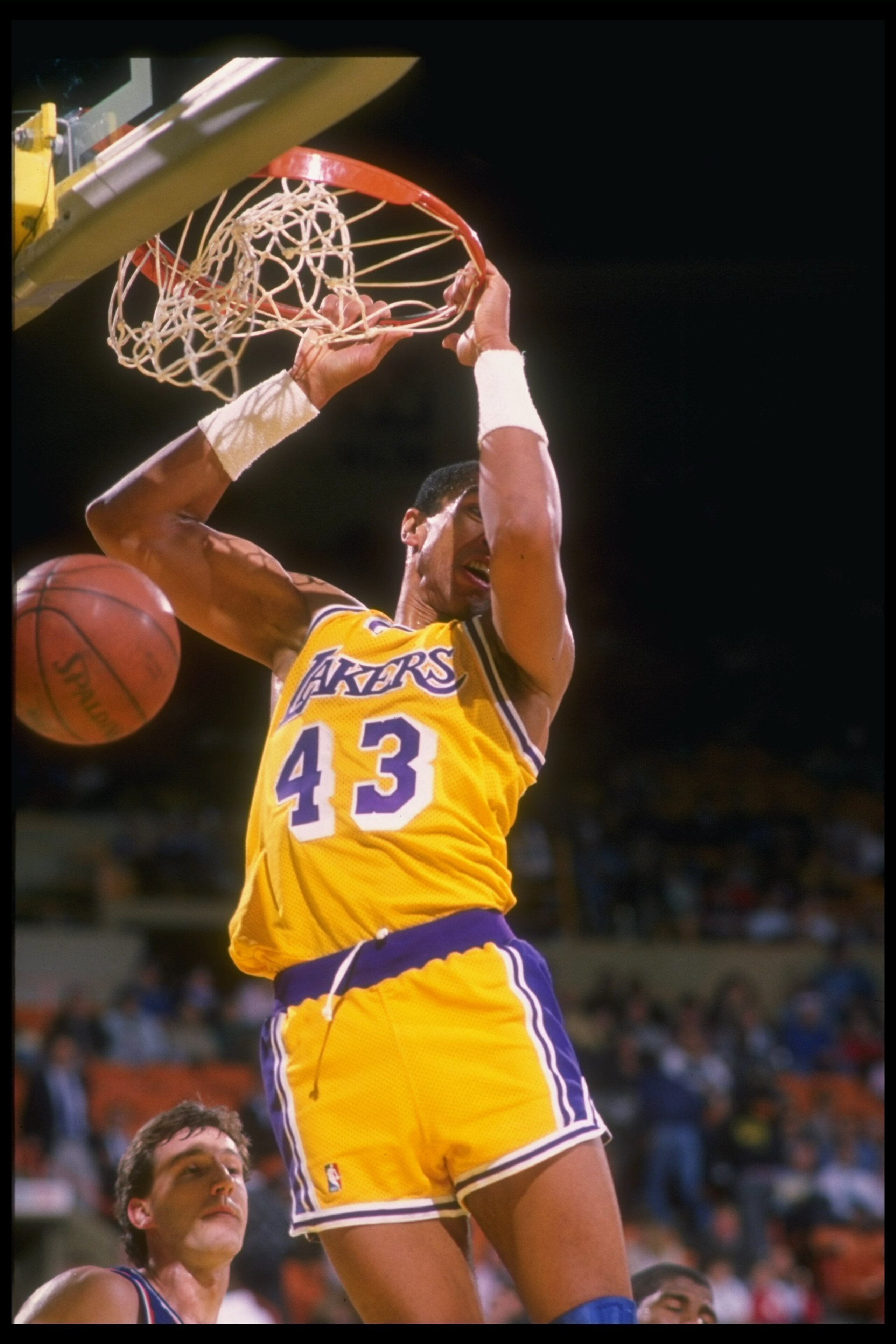 1988-1989:  Mychal Thompson of the Los Angeles Lakers sinks the ball during a game. Mandatory Credit: Mike Powell  /Allsport Mandatory Credit: Mike Powell  /Allsport