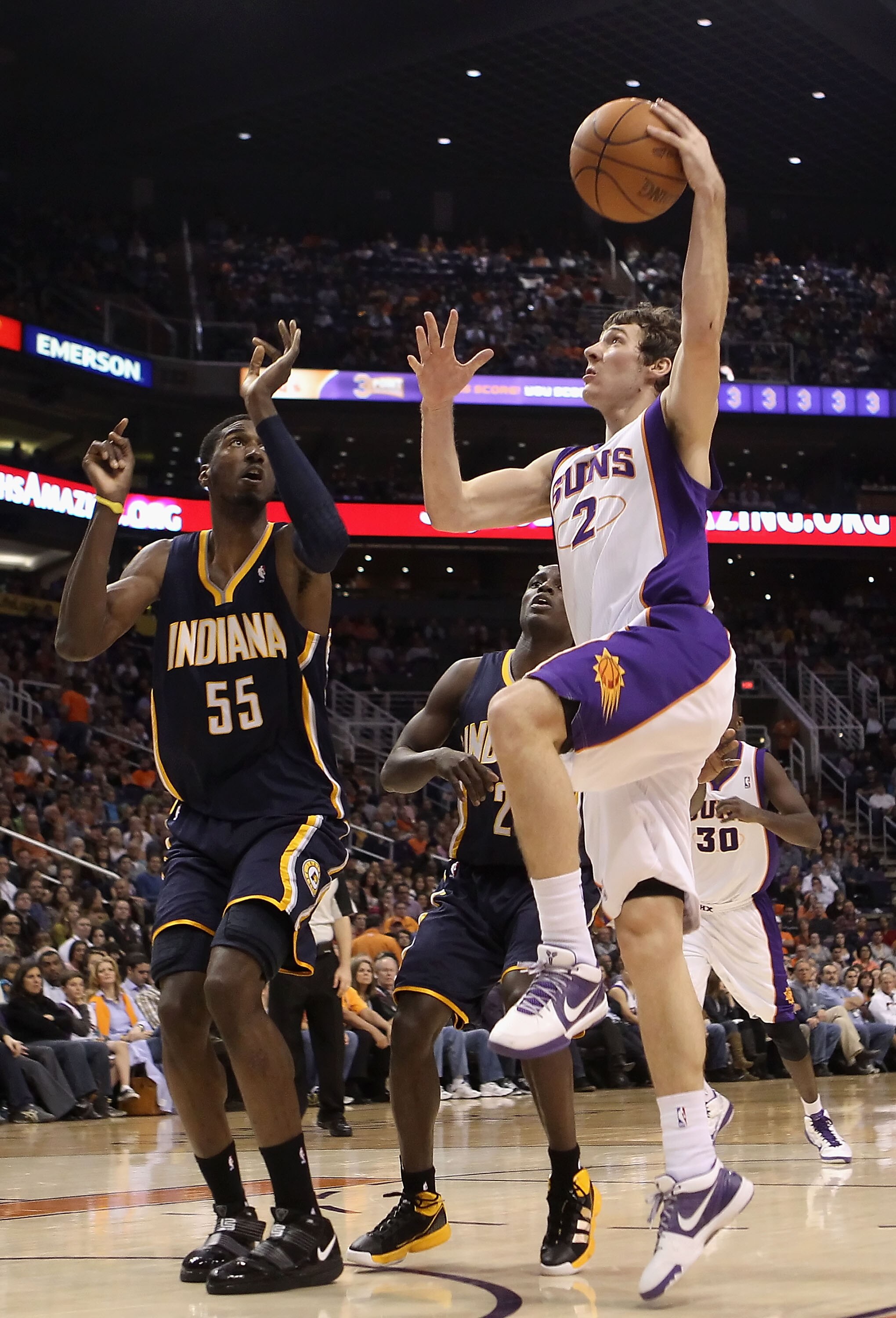 PHOENIX - DECEMBER 03: Goran Dragic #2 of the Phoenix Suns puts up a shot over Roy Hibbert #55 of the Indiana Pacers during the NBA game at US Airways Center on December 3, 2010 in Phoenix, Arizona. NOTE TO USER: User expressly acknowledges and agrees t PHOENIX - DECEMBER 03: Goran Dragic #2 of the Phoenix Suns puts up a shot over Roy Hibbert #55 of the Indiana Pacers during the NBA game at US Airways Center on December 3, 2010 in Phoenix, Arizona. NOTE TO USER: User expressly acknowledges and agrees t
