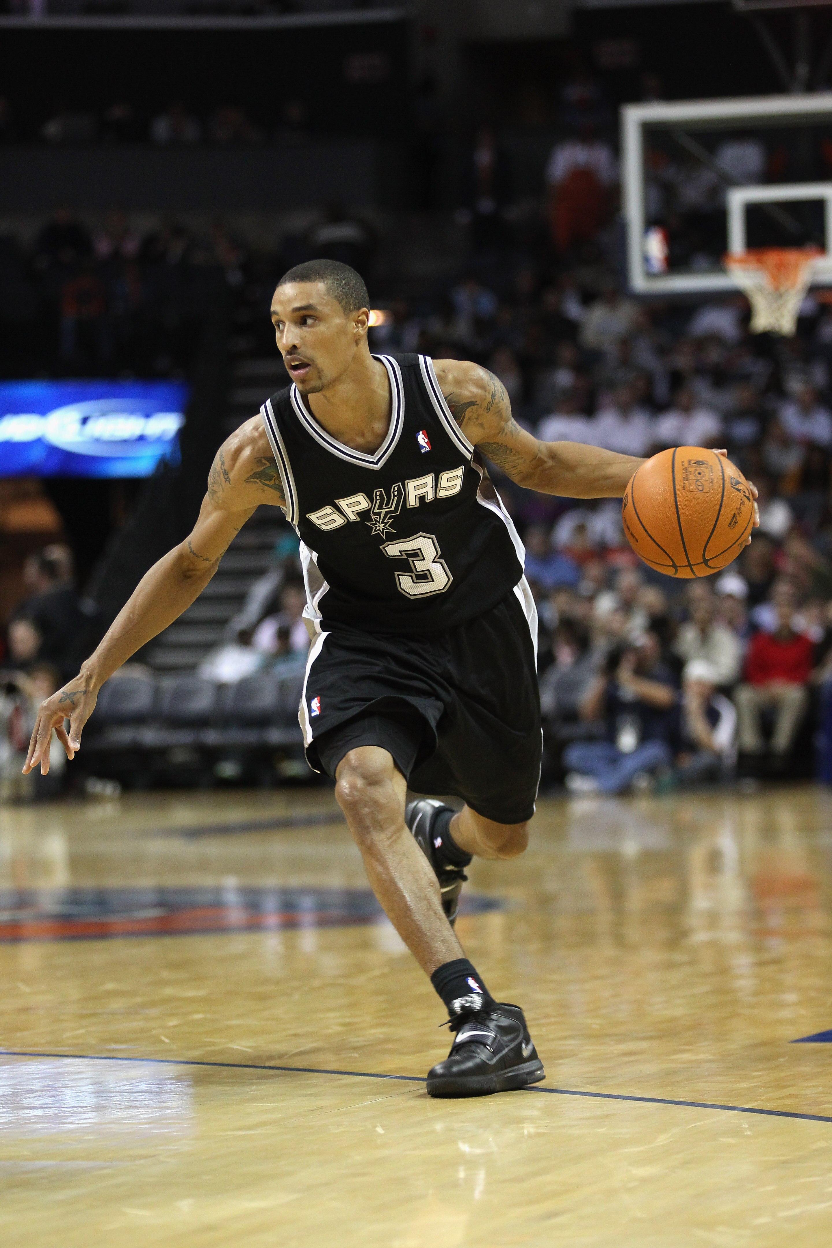 CHARLOTTE, NC - NOVEMBER 08: George Hill #3 of the San Antonio Spurs against the Charlotte Bobcats during their game at Time Warner Cable Arena on November 8, 2010 in Charlotte, North Carolina. NOTE TO USER: User expressly acknowledges and agrees that, CHARLOTTE, NC - NOVEMBER 08: George Hill #3 of the San Antonio Spurs against the Charlotte Bobcats during their game at Time Warner Cable Arena on November 8, 2010 in Charlotte, North Carolina. NOTE TO USER: User expressly acknowledges and agrees that,