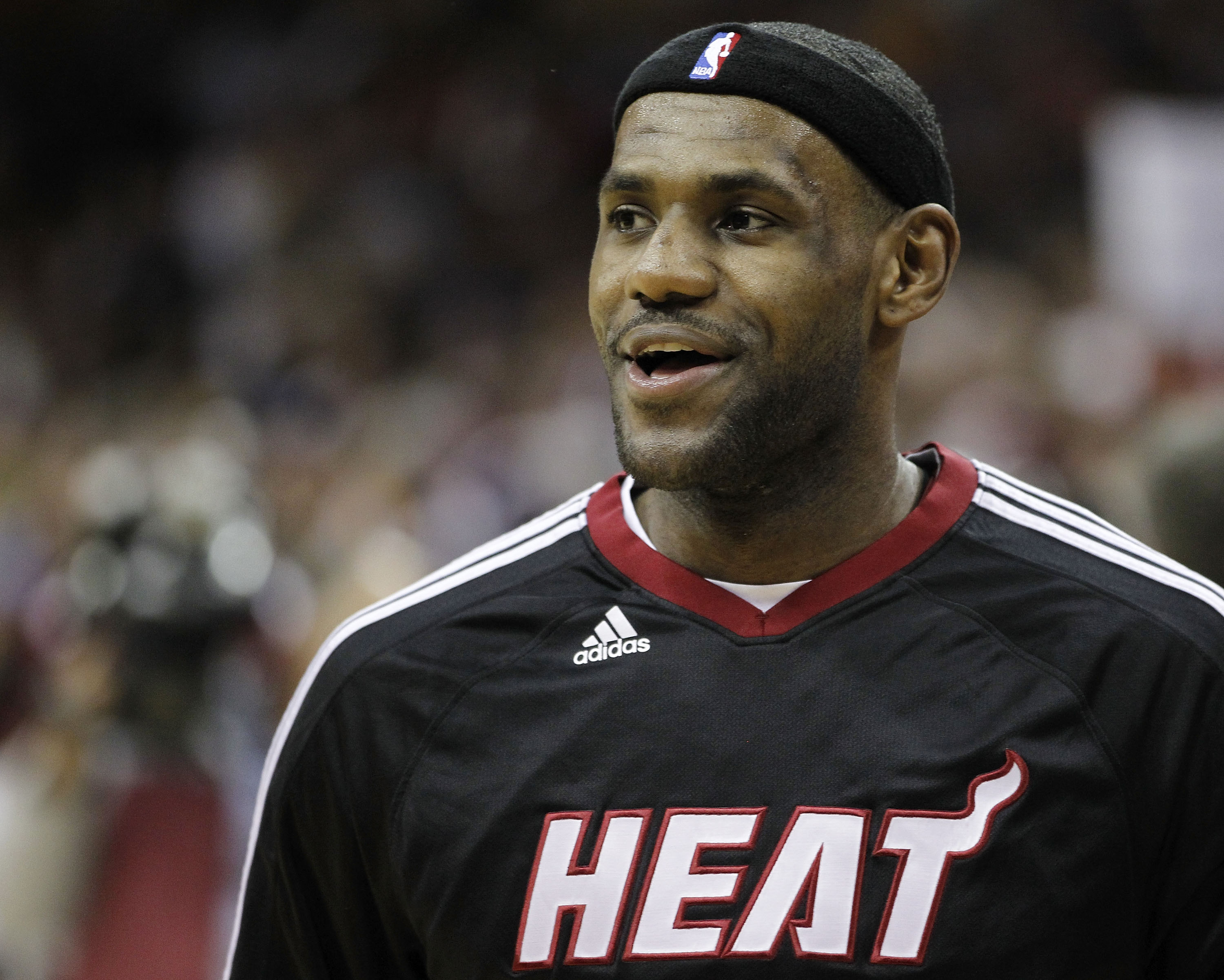 CLEVELAND, OH - DECEMBER 02:  LeBron James #6 of the Miami Heat smiles in the layup line prior to playing the Cleveland Cavaliers at Quicken Loans Arena on December 2, 2010 in Cleveland, Ohio. NOTE TO USER: User expressly acknowledges and agrees that, by