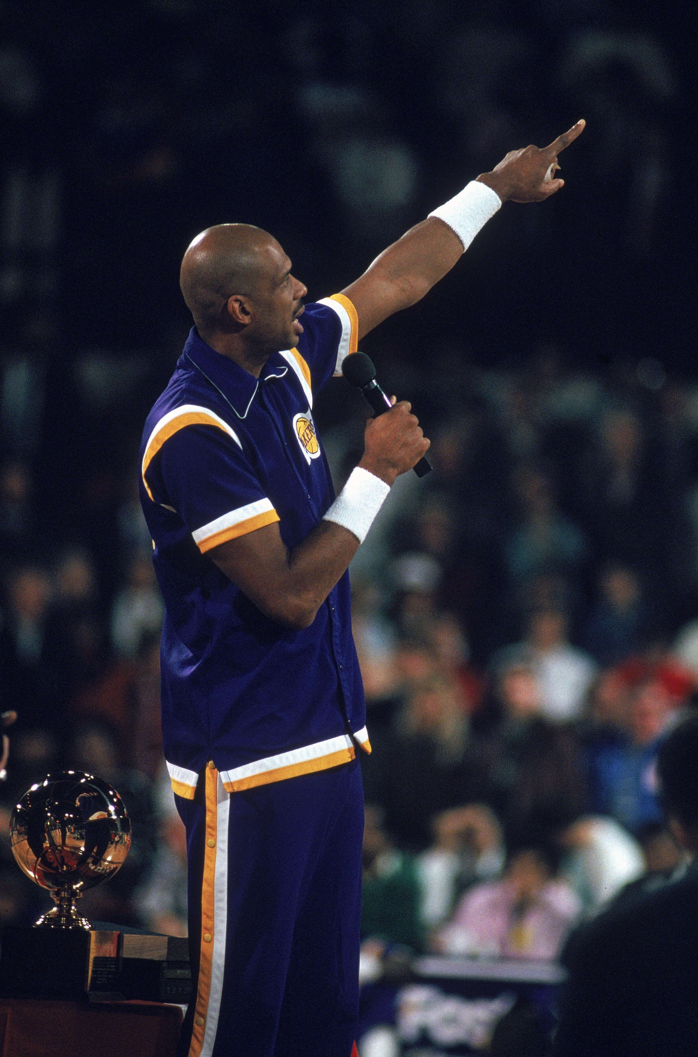 CHICAGO - 1989:  NBA Hall of Fame center Kareem Abdul-Jabbar #33 of the Los Angeles Lakers talks to the crowd after receiving an award during a ceremony at Chicago Stadium in Chicago, Illinois in 1989. (Photo by: Jonathan Daniel/Getty Images)