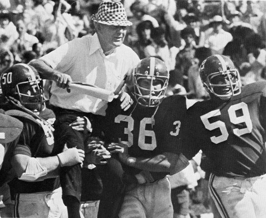 That's Sylvester Croom (#59) and his mentor after a victory.
