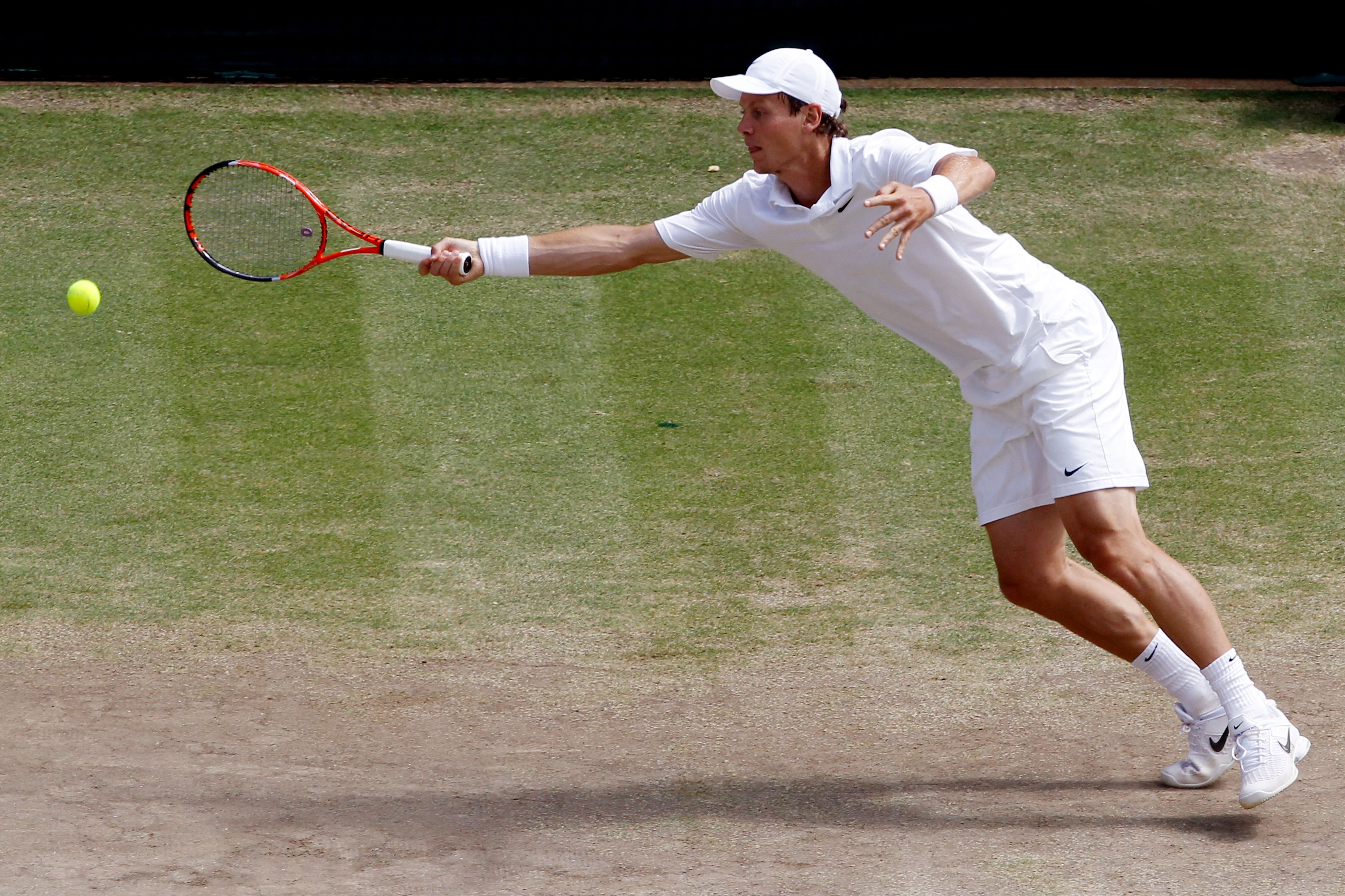LONDON, ENGLAND - JULY 04:  Tomas Berdych of Czech Republic in action during the Men's Singles Final match against Rafael Nadal of Spain on Day Thirteen of the Wimbledon Lawn Tennis Championships at the All England Lawn Tennis and Croquet Club on July 4, 