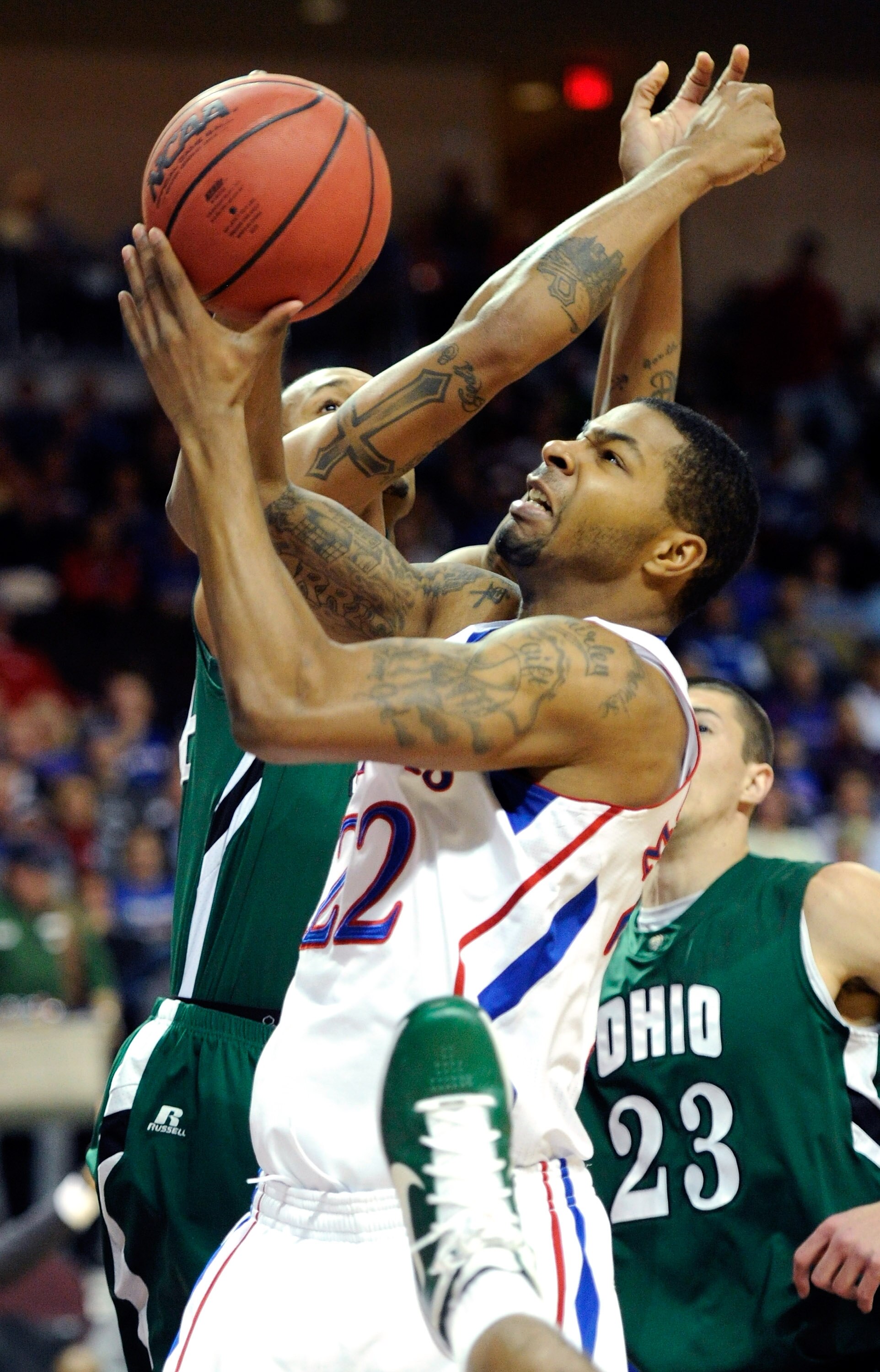 LAS VEGAS - NOVEMBER 26:  Marcus Morris #22 of the Kansas Jayhawks shoots against Asown Sayles #44 of the Ohio Bobcats during the third round of the Las Vegas Invitational at The Orleans Arena November 26, 2010 in Las Vegas, Nevada. Kansas won 98-41.  (Ph