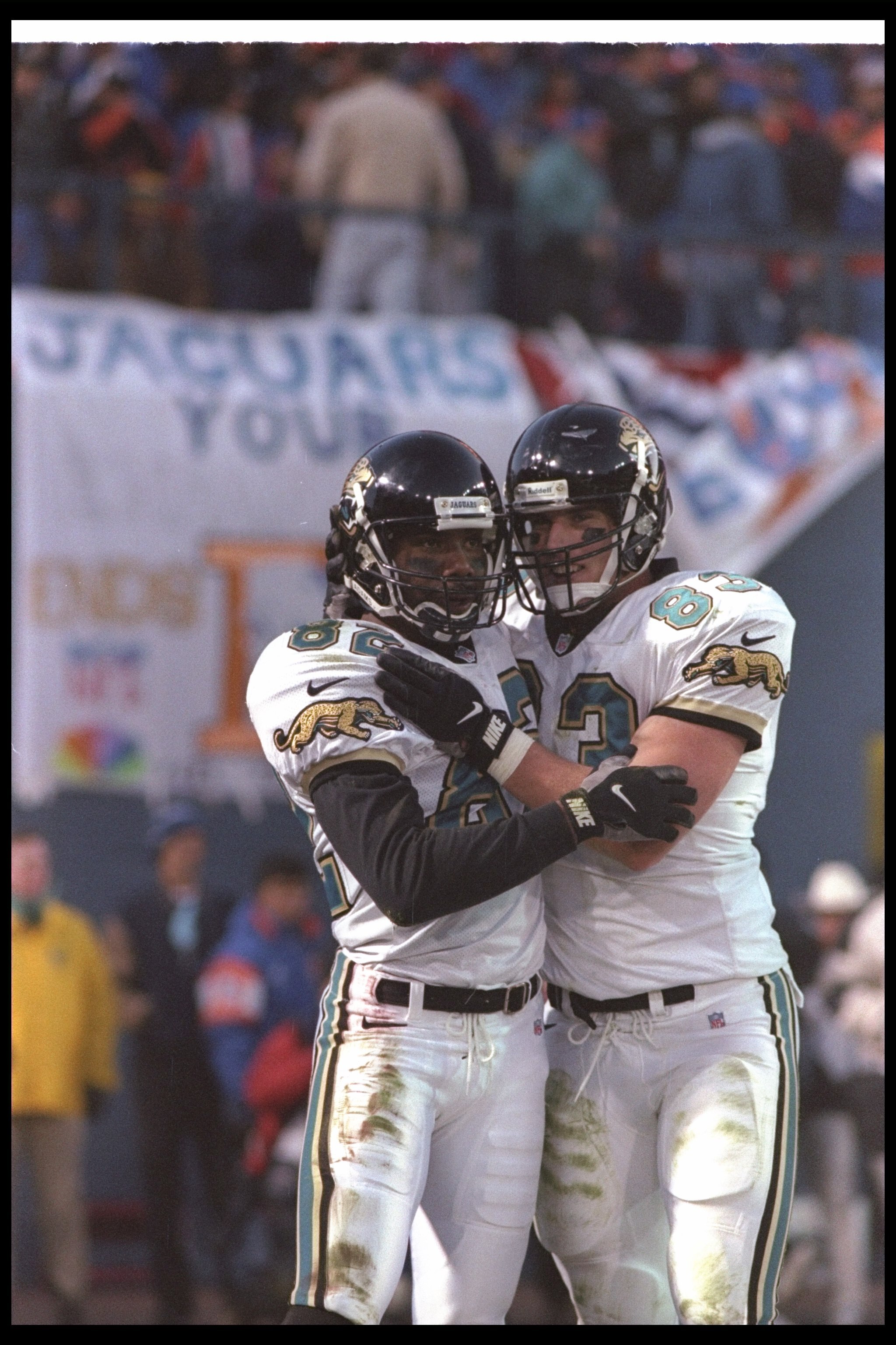 4 Jan 1997:  Jacksonville Jaguars tight end Pete Mitchell (right) and wide receiver Jimmy Smith celebrate during a playoff game against the Denver Broncos at Mile High Stadium in Denver, Colorado.  The Jaguars won the game, 30-27. Mandatory Credit: Otto G