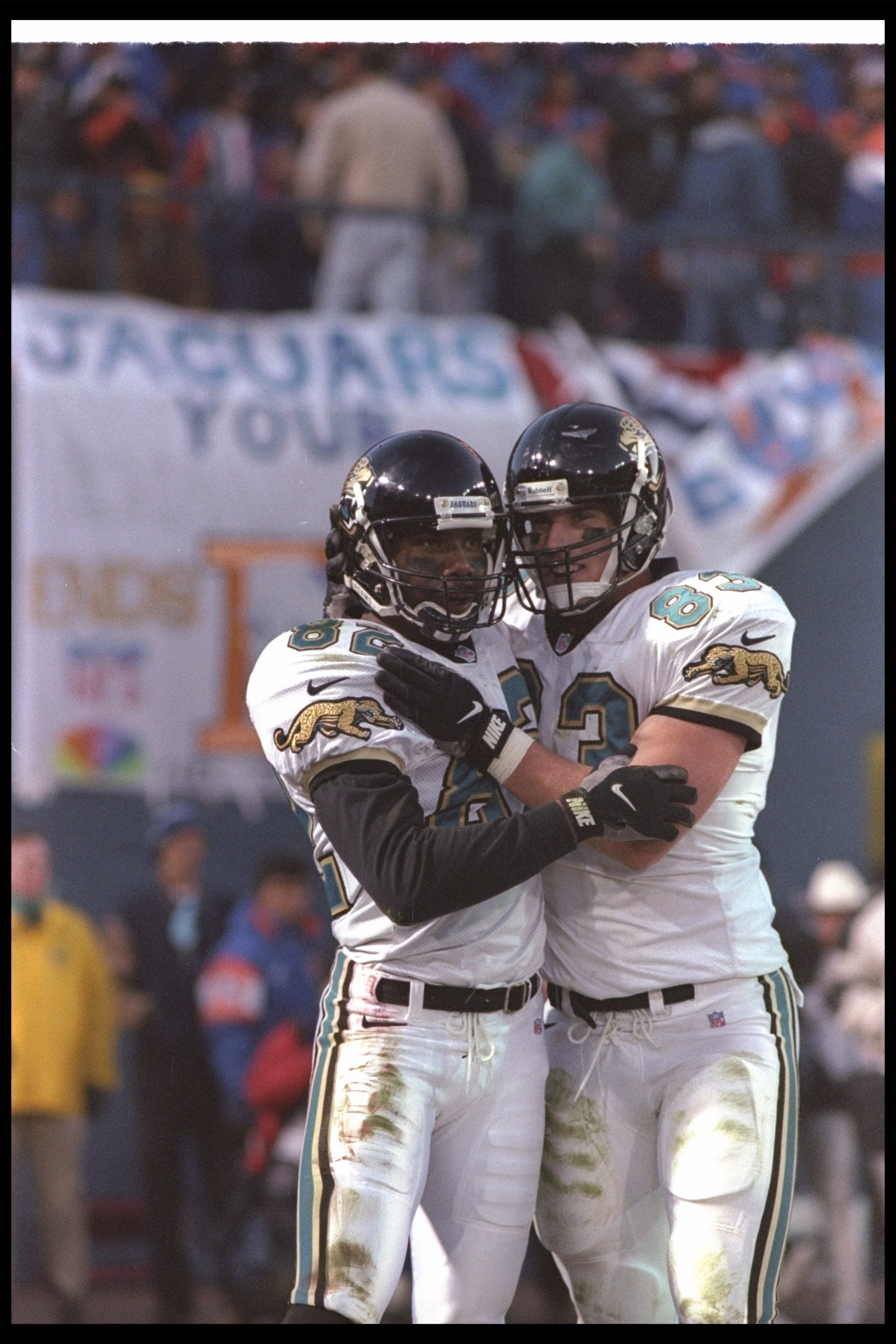 4 Jan 1997:  Jacksonville Jaguars tight end Pete Mitchell (right) and wide receiver Jimmy Smith celebrate during a playoff game against the Denver Broncos at Mile High Stadium in Denver, Colorado.  The Jaguars won the game, 30-27. Mandatory Credit: Otto G