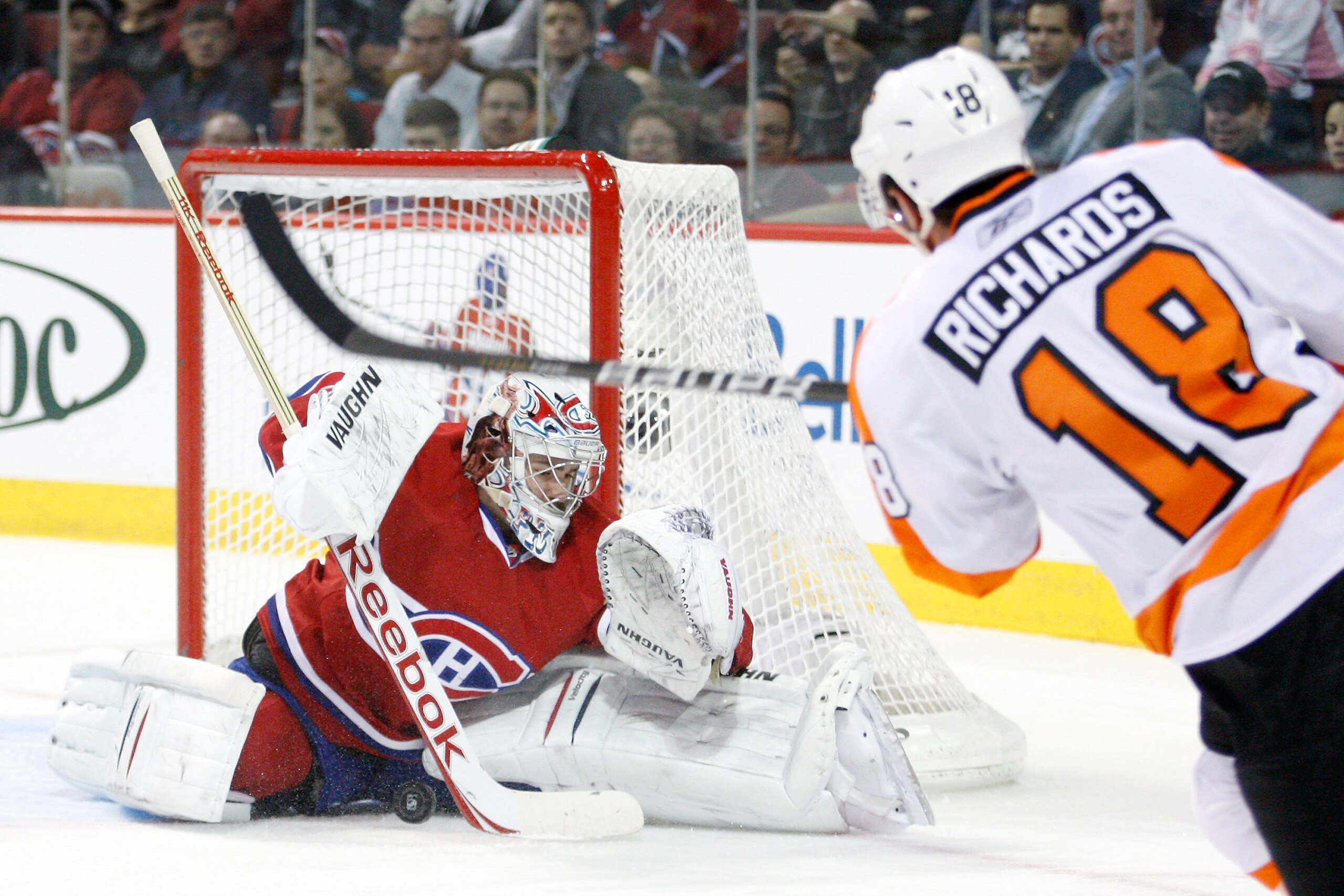 MONTREAL- NOVEMBER 16:  Carey Price #31 of the Montreal Canadiens stops the puck on a shot by Mike Richards #18 of the Philadelphia Flyers during the NHL game at the Bell Centre on November 16, 2010 in Montreal, Quebec, Canada.  (Photo by Richard Wolowicz