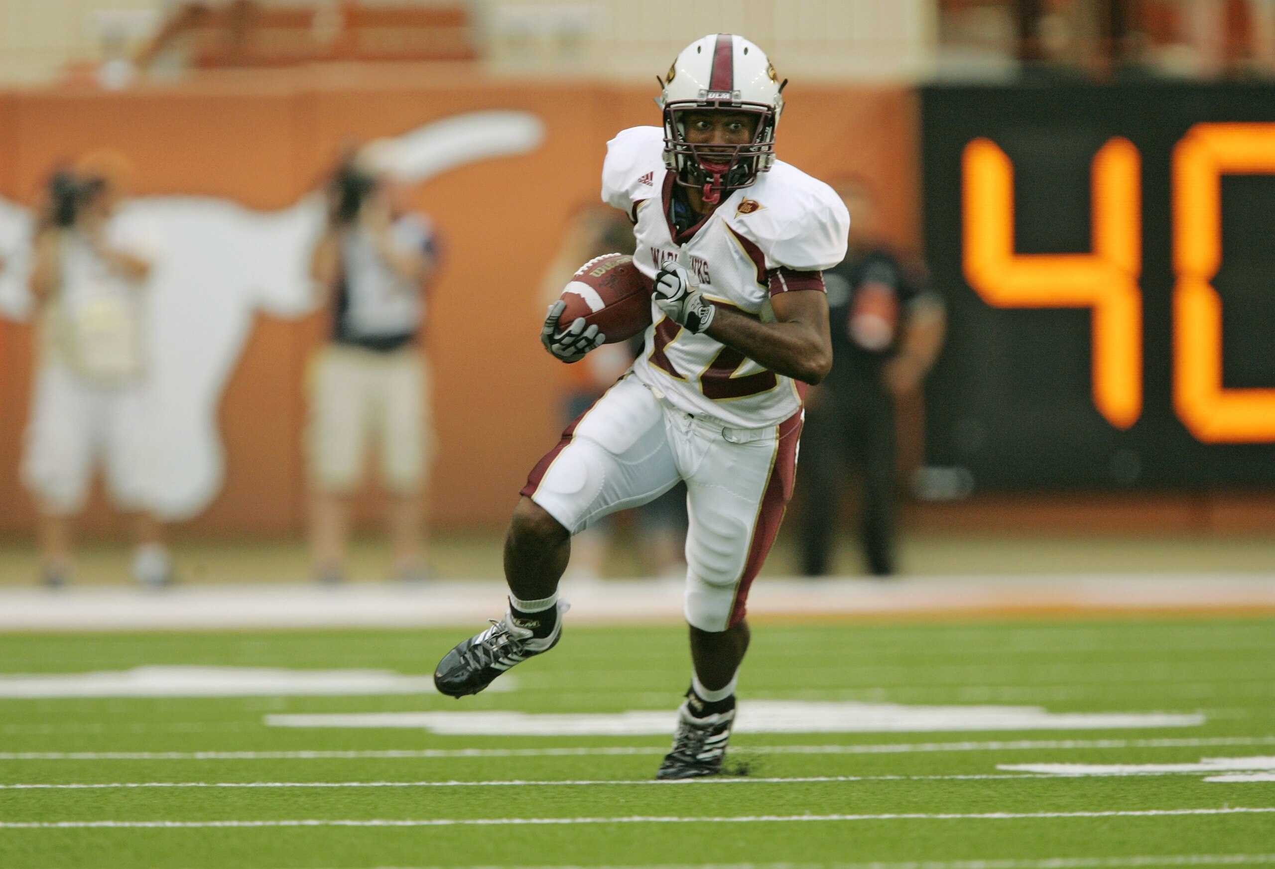 AUSTIN, TX - SEPTEMBER 5:  Wide receiver Luther Ambrose #22 of the Louisiana Monroe Warhawks runs the ball for yardage during their game against the Texas Longhorns on September 5, 2009 at Darrell K Royal-Texas Memorial Stadium in Austin, Texas. The Longh