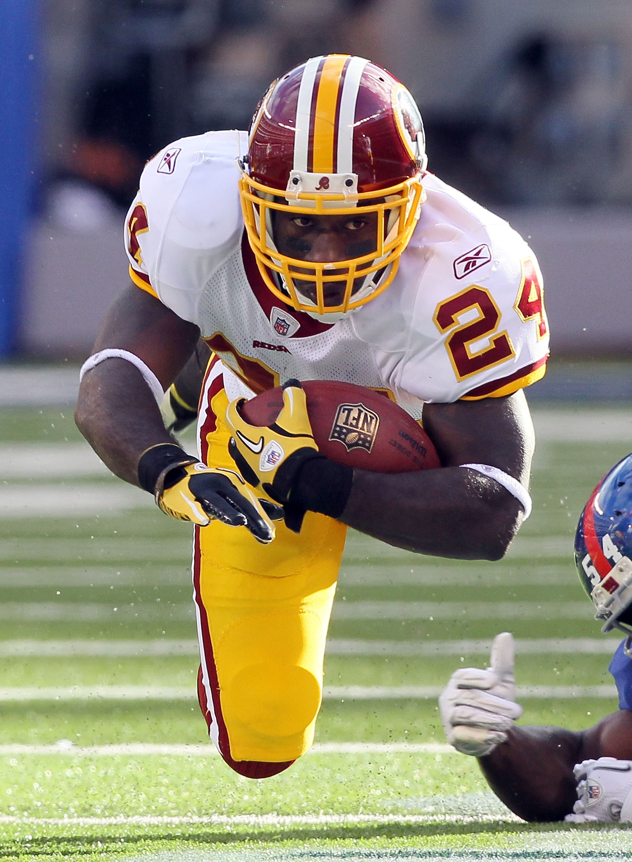 EAST RUTHERFORD, NJ - DECEMBER 05: James Davis #24 of the Washington Redskins carries the ball against the New York Giants on December 5, 2010 at the New Meadowlands Stadium in East Rutherford, New Jersey.  (Photo by Jim McIsaac/Getty Images)