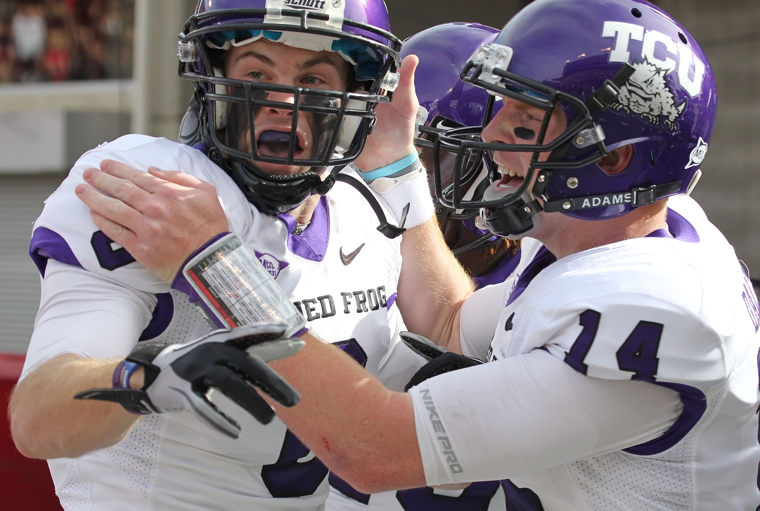 SALT LAKE CITY, UT - NOVEMBER 6: Bart Johnson #6 and Andy Dalton #14 of the TCU Horned Frogs celebrate a touchdown pass during a game against the Utah Utes during the first half of an NCAA football game November 6, 2010 at Rice-Eccles Stadium in Salt Lake
