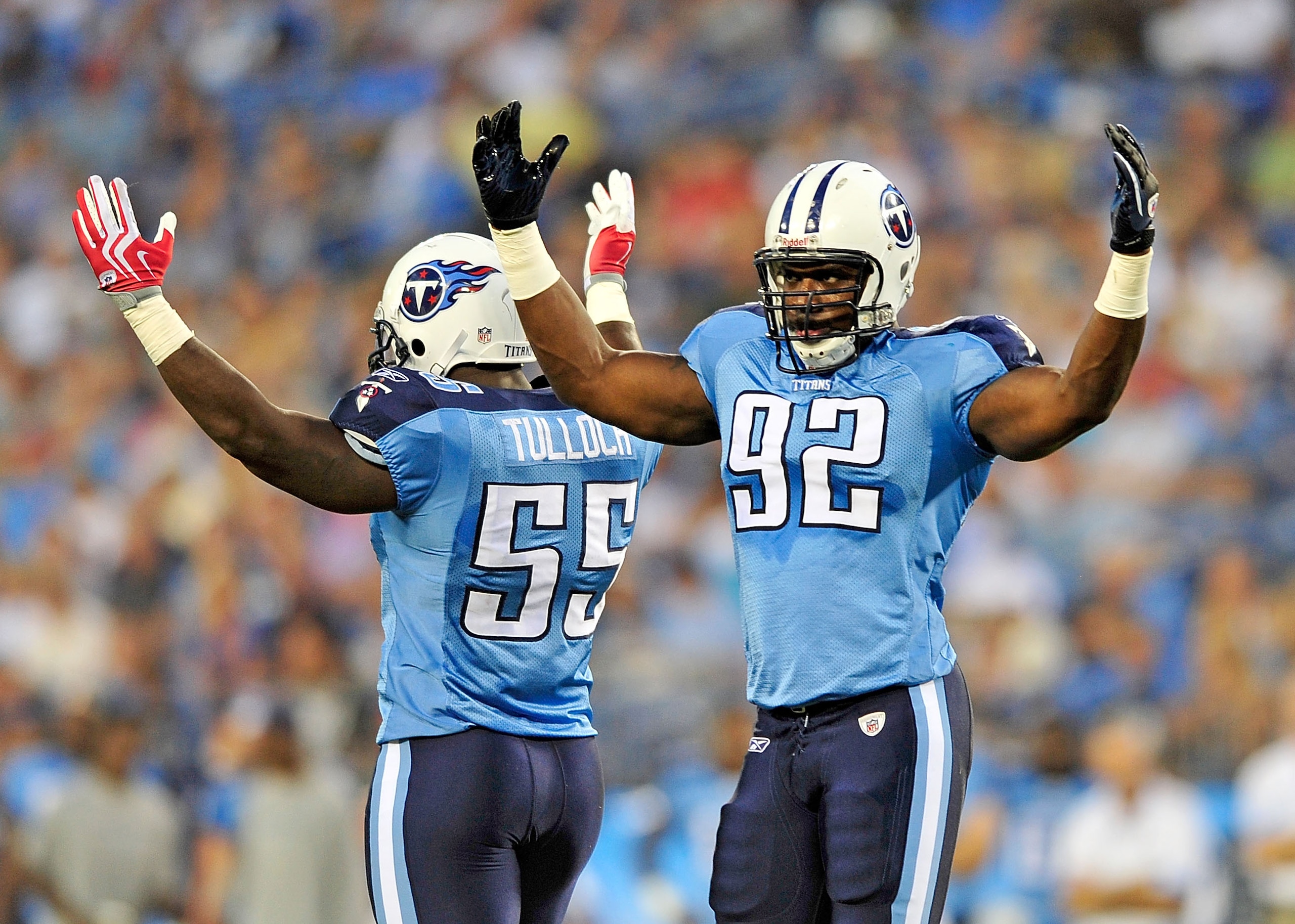 NASHVILLE, TN - SEPTEMBER 02:  Stephen Tulloch #55 and Will Witherspoon #92 of the Tennessee Titans amp up the crowd during an exhibition game against the New Orleans Saints at LP Field on September 2, 2010 in Nashville, Tennessee.  (Photo by Grant Halver