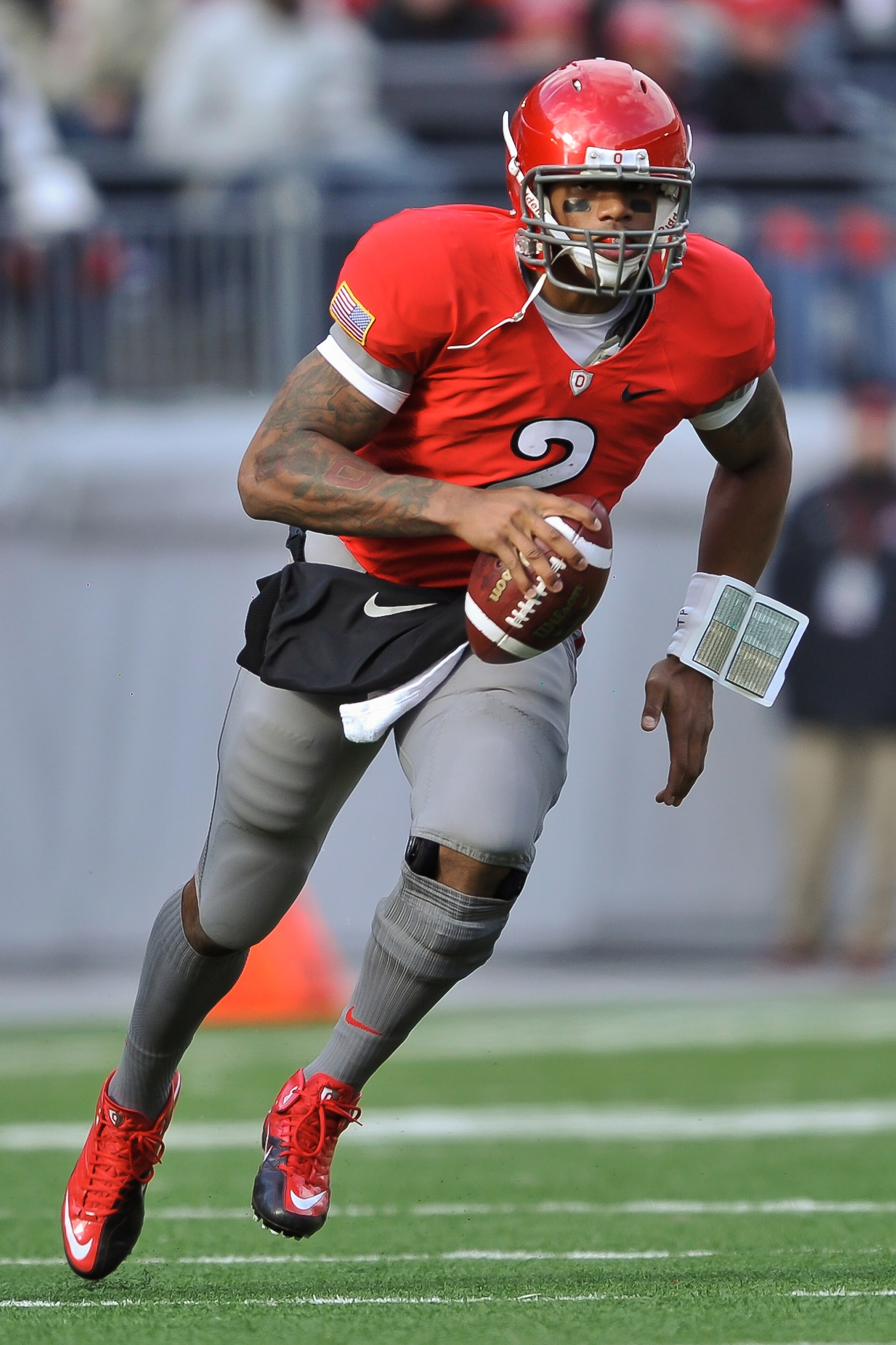 COLUMBUS, OH - NOVEMBER 27:  Quarterback Terrelle Pryor #2 of the Ohio State Buckeyes runs with the ball against the Michigan Wolverines at Ohio Stadium on November 27, 2010 in Columbus, Ohio.  (Photo by Jamie Sabau/Getty Images)