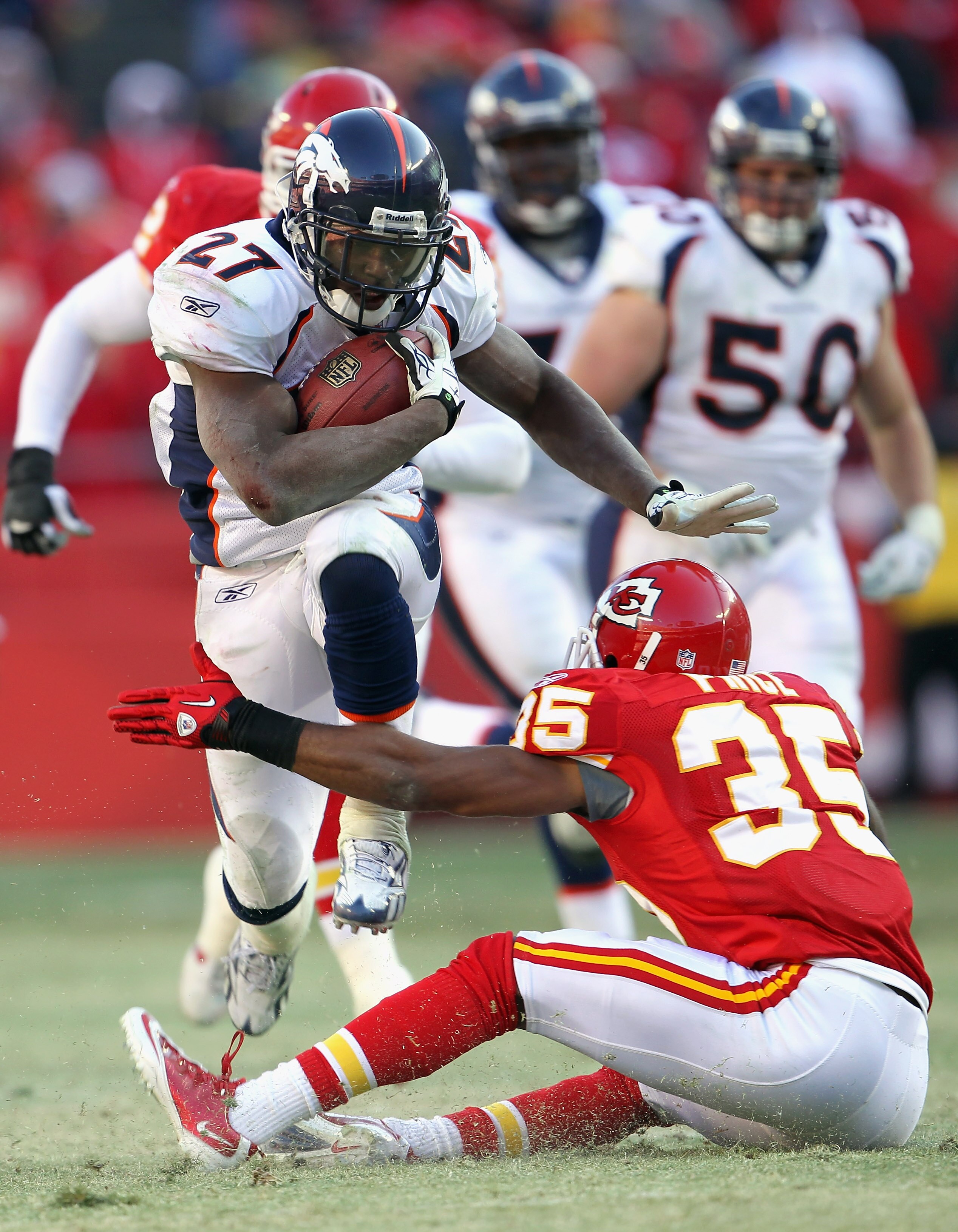KANSAS CITY, MO - DECEMBER 05:  Knowshon Moreno #27 of the Denver Broncos carries the ball as Ricky Price #35 of the Kansas City Chiefs defends during the game on December 5, 2010 at Arrowhead Stadium in Kansas City, Missouri.  (Photo by Jamie Squire/Gett