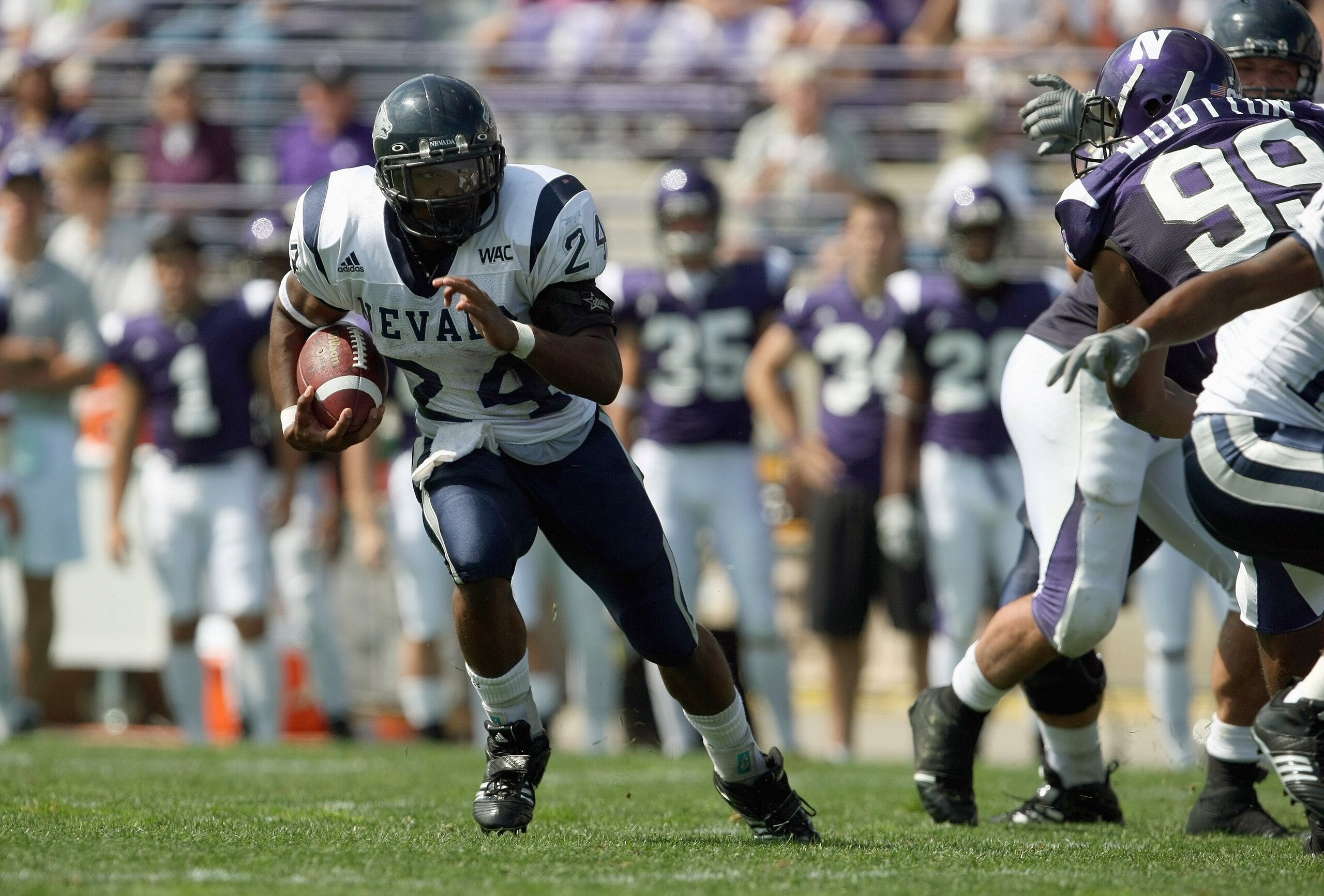 EVANSTON, IL - SEPTEMBER 8: Brandon Fragger #24 of the Nevada Wolf Pack carries the ball against the Northwestern Wildcats on September 8, 2007 at Ryan Field at Northwestern University in Evanston, Illinois. (Photo by Jonathan Daniel/Getty Images)
