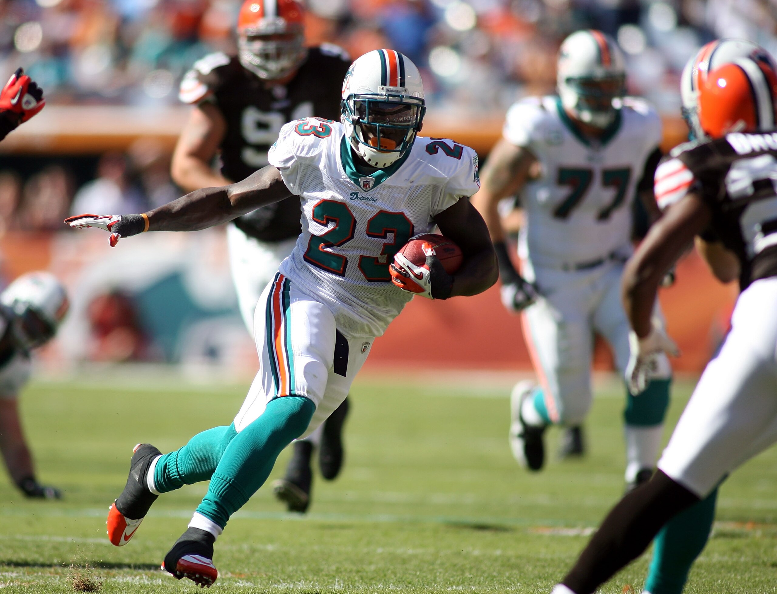 MIAMI - DECEMBER 05:  Running back Ronnie Brown #23 of the miami Dolphins carries against the Cleveland Browns at Sun Life Stadium on December 5, 2010 in Miami, Florida.  (Photo by Marc Serota/Getty Images)