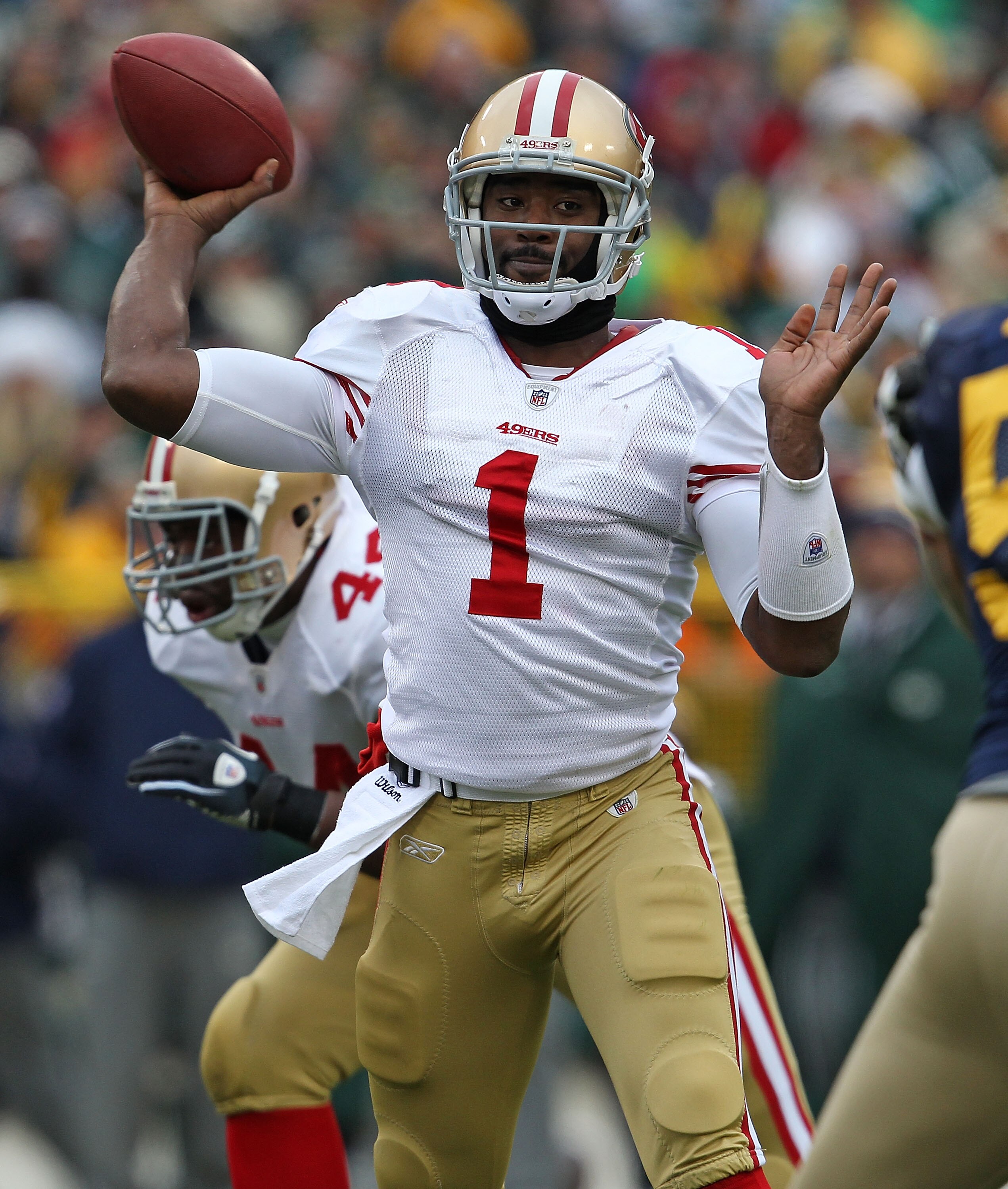 GREEN BAY, WI - DECEMBER 05: Troy Smith #1 of the San Francisco 49ers throws a pass against the Green Bay Packers at Lambeau Field on December 5, 2010 in Green Bay, Wisconsin. (Photo by Jonathan Daniel/Getty Images)
